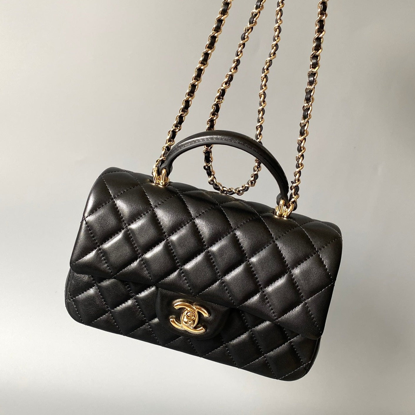 mini flap bag top handle 20cm black lambskin gold hardware