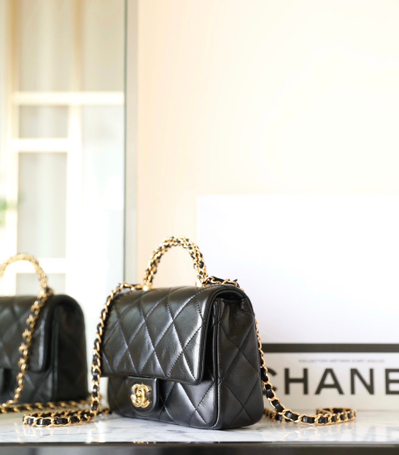 24B Mini Flap Bag With Top Handle 19cm Black Lambskin