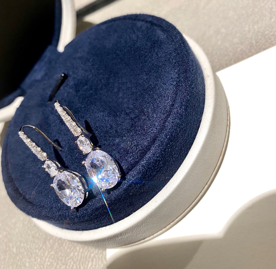 OVAL SHAPE SILVER DIAMOND EARRINGS