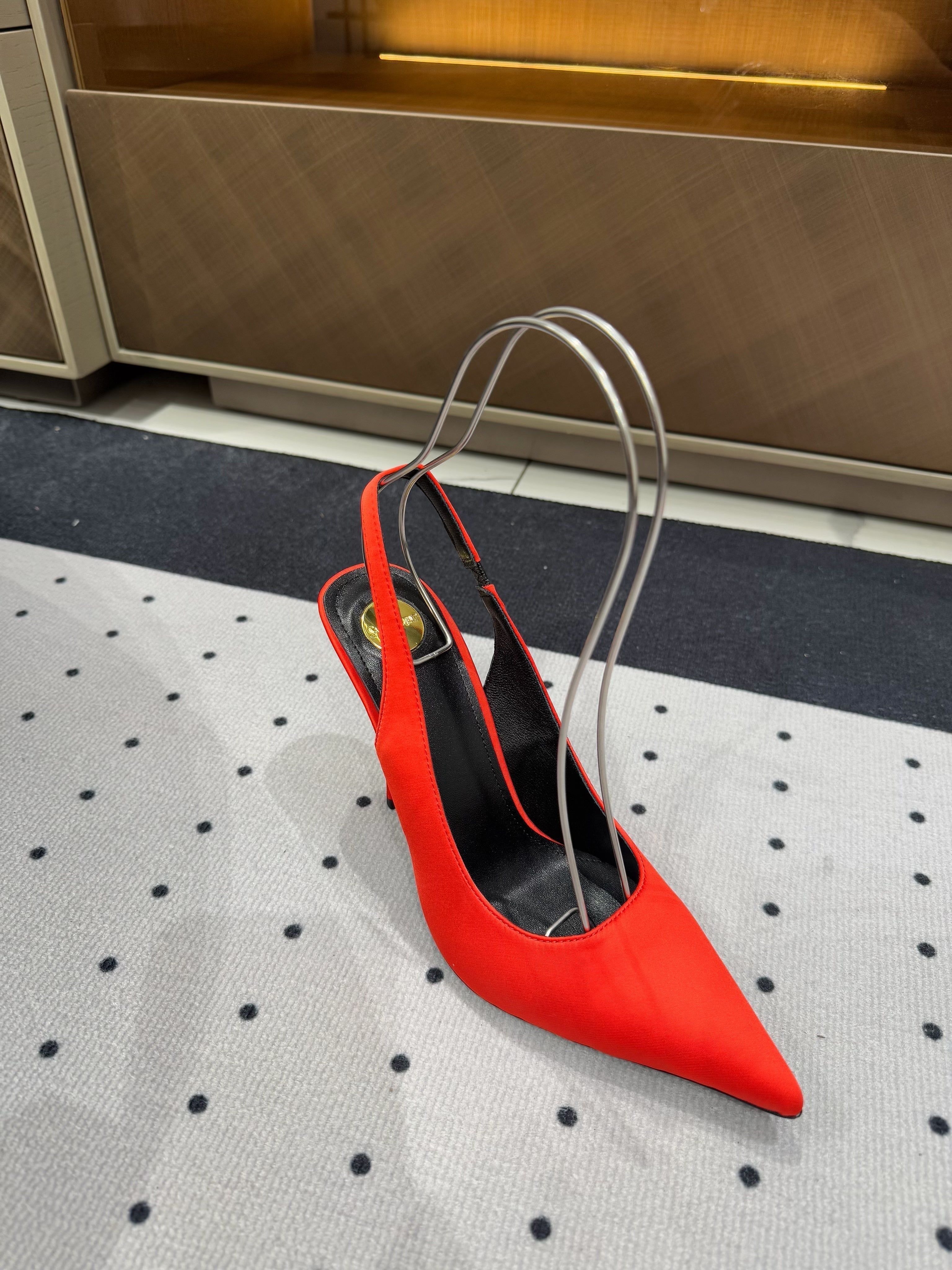L'ENTRACTE SLINGBACK PUMPS IN RED SATIN