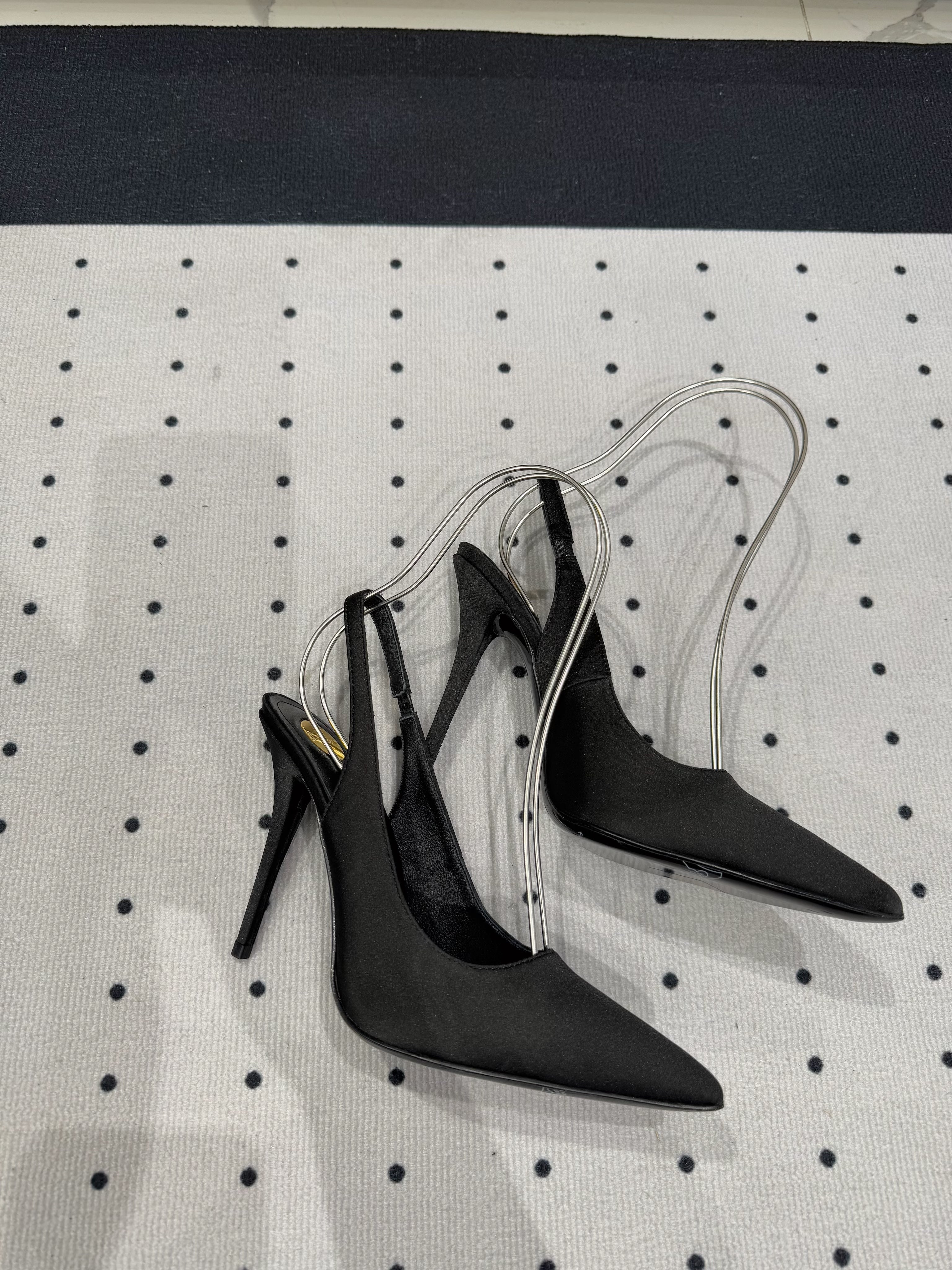 L'ENTRACTE SLINGBACK PUMPS IN BLACK SATIN