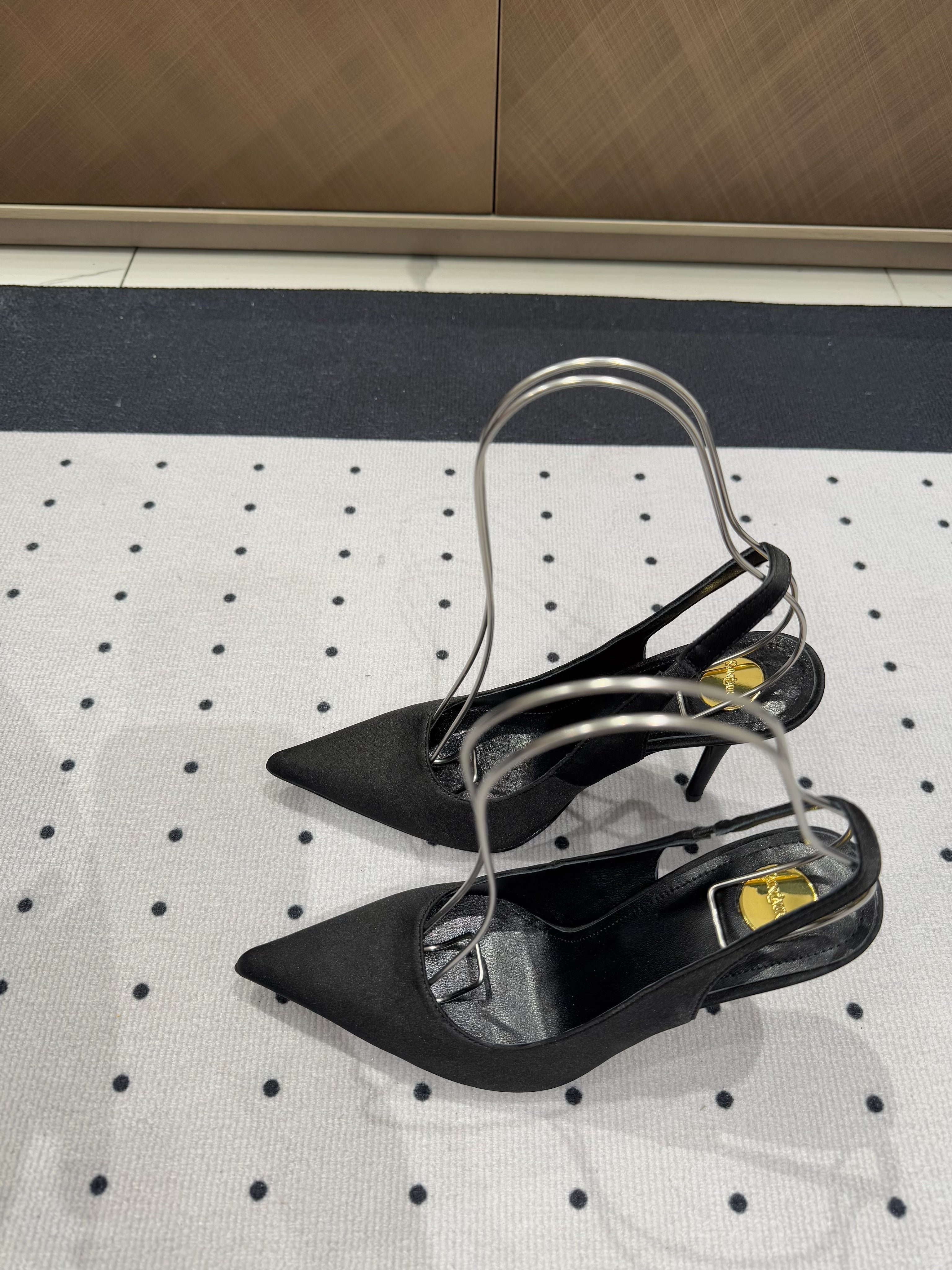 L'ENTRACTE SLINGBACK PUMPS IN BLACK SATIN