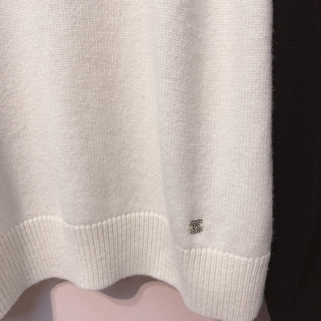 Chanel 25 Bow Sweater Black White Wool 317422