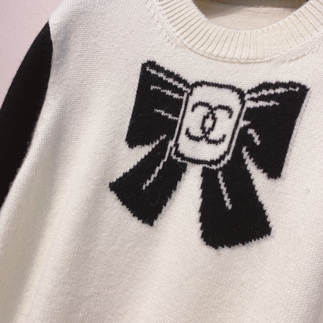 Chanel 25 Bow Sweater Black White Wool 317422