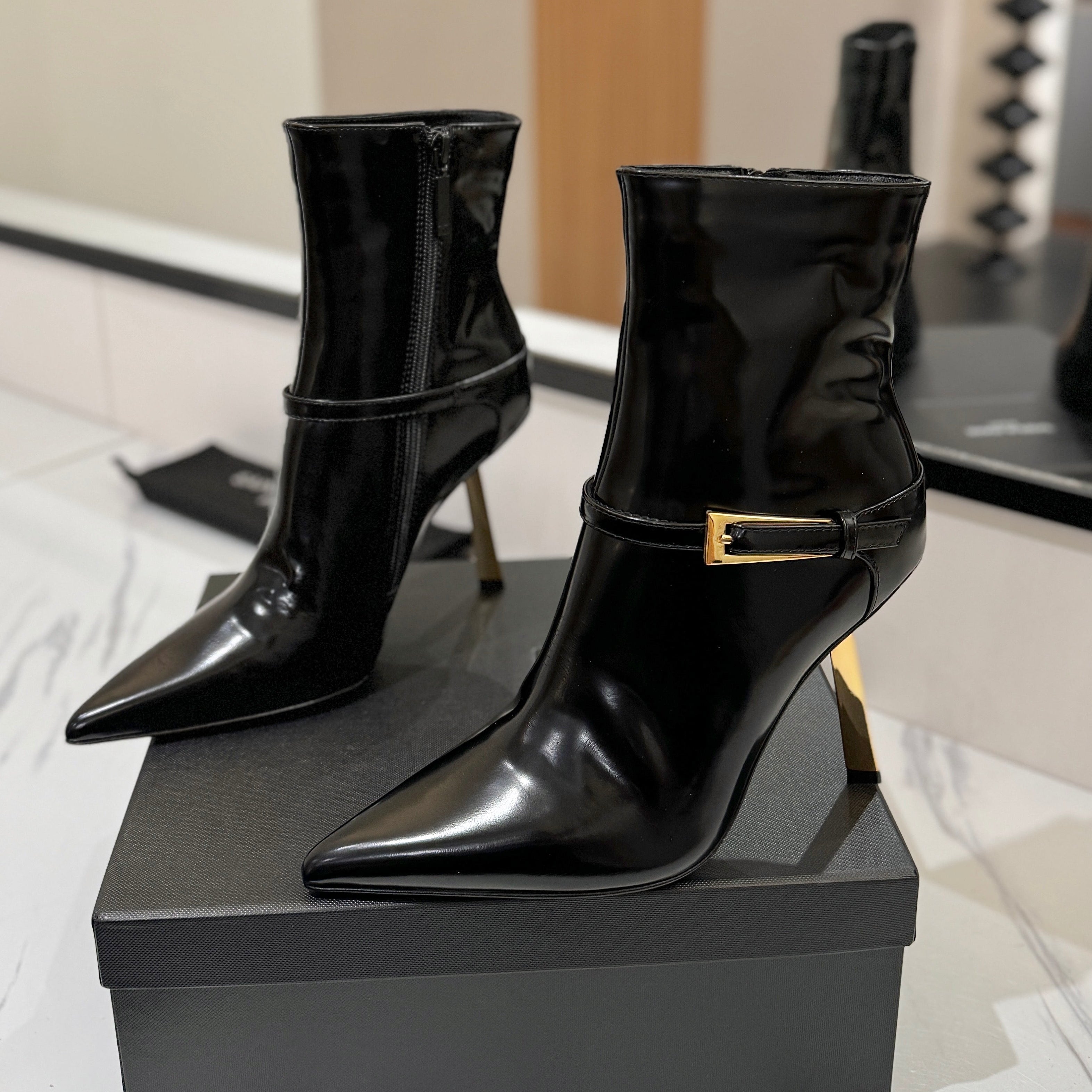 YSL 25 Metal Stiletto Martin Boots Black Gold Cowhide 520779