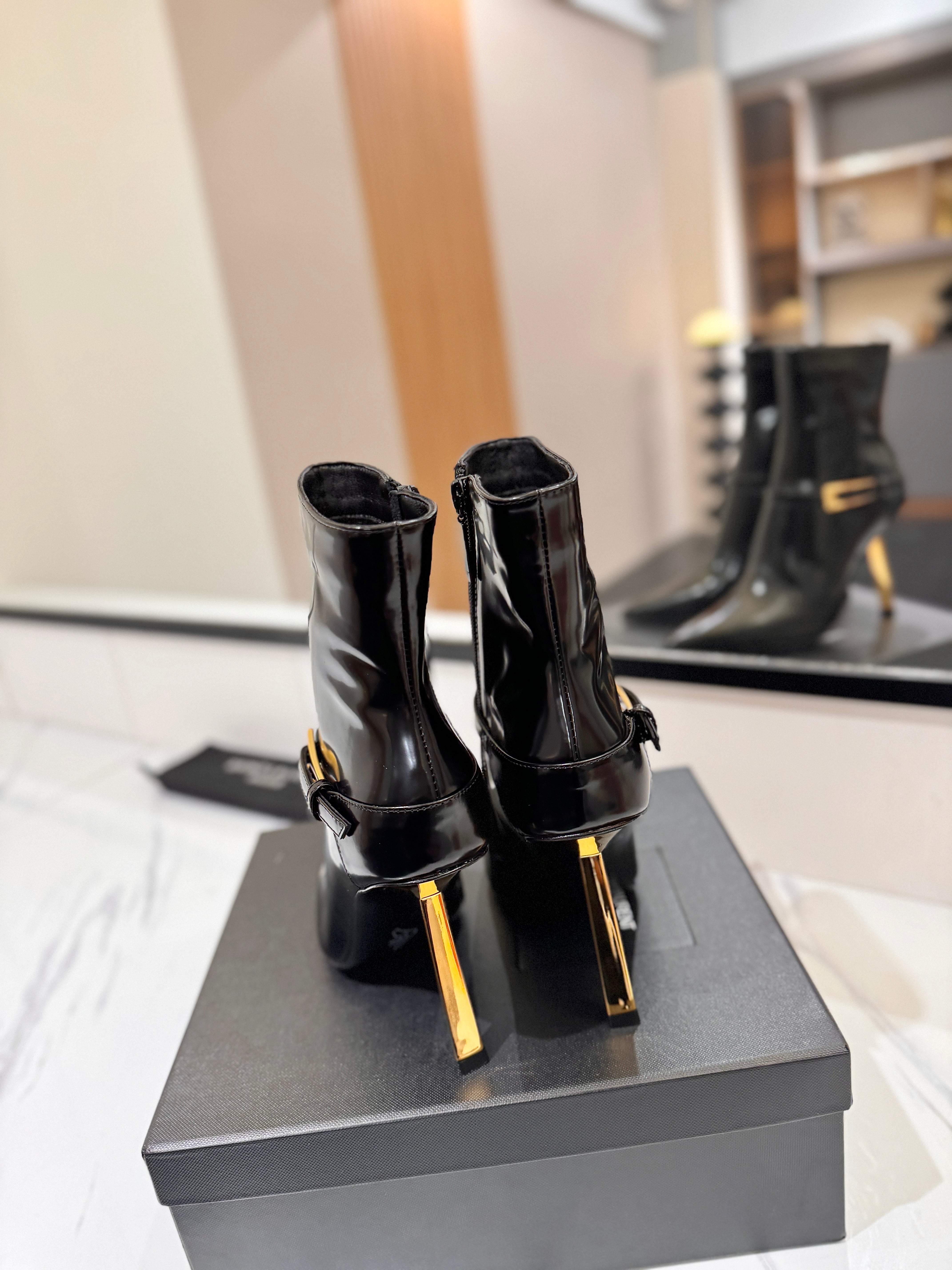 YSL 25 Metal Stiletto Martin Boots Black Gold Cowhide 520779