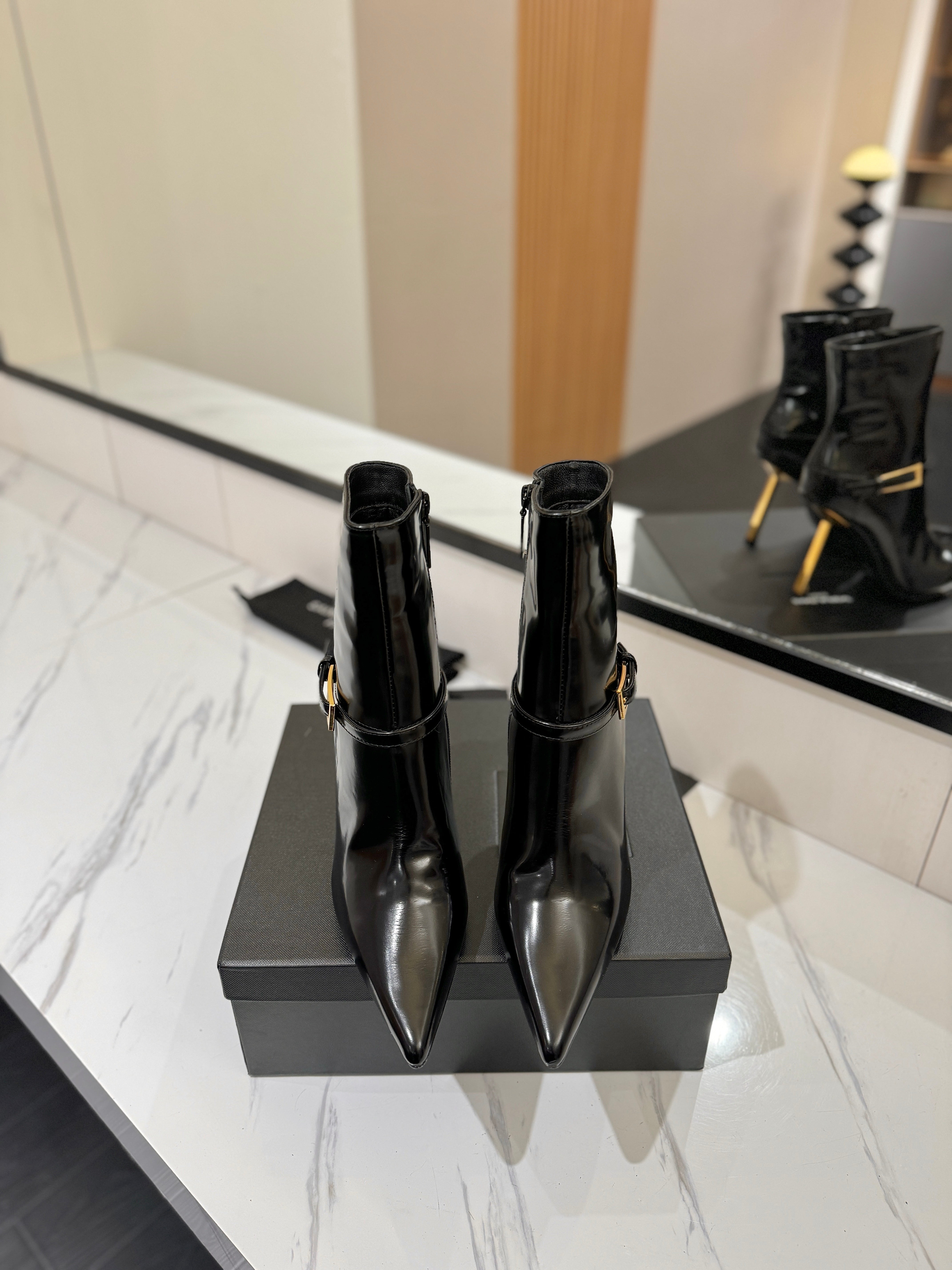 YSL 25 Metal Stiletto Martin Boots Black Gold Cowhide 520779