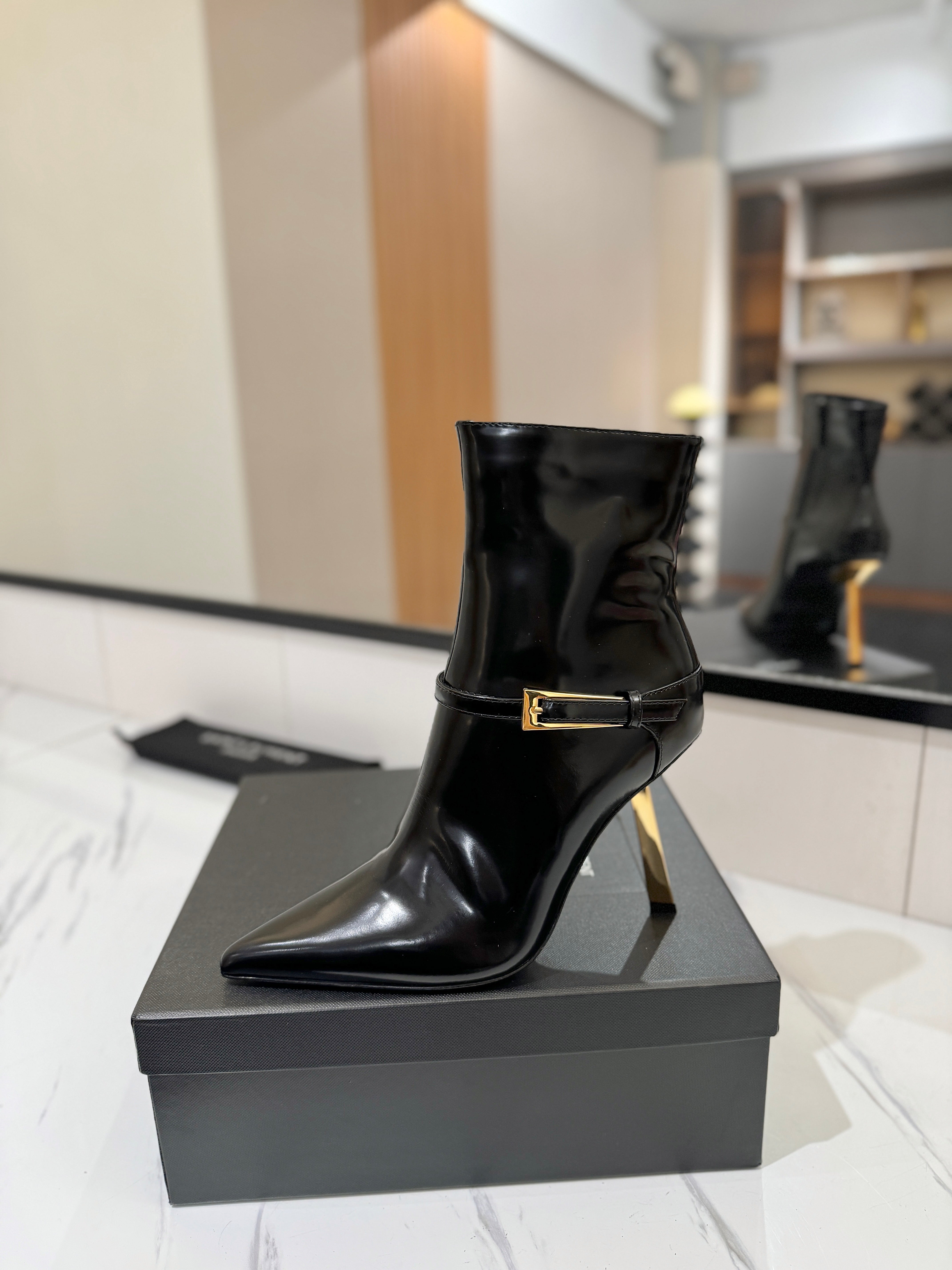 YSL 25 Metal Stiletto Martin Boots Black Gold Cowhide 520779