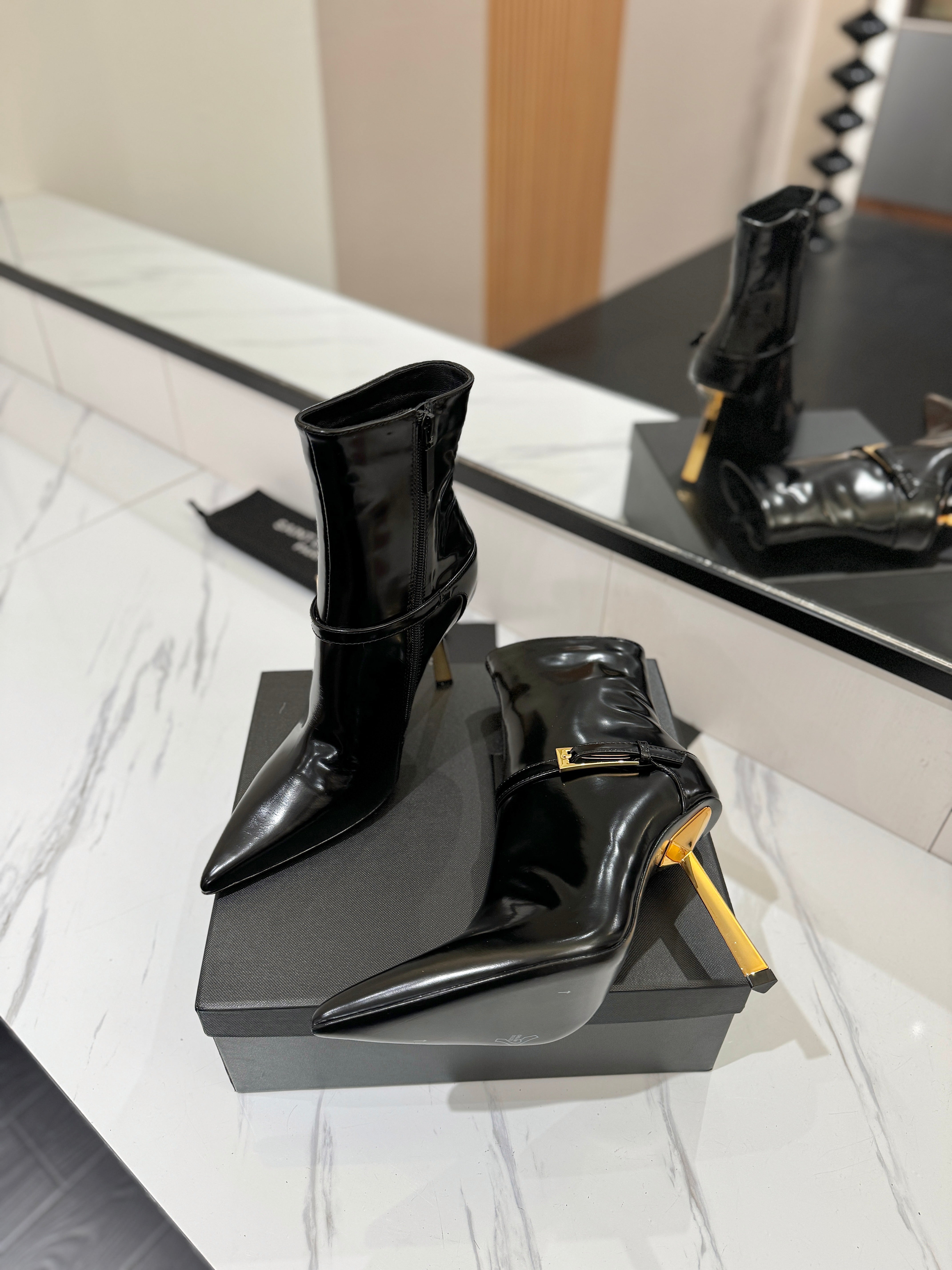 YSL 25 Metal Stiletto Martin Boots Black Gold Cowhide 520779