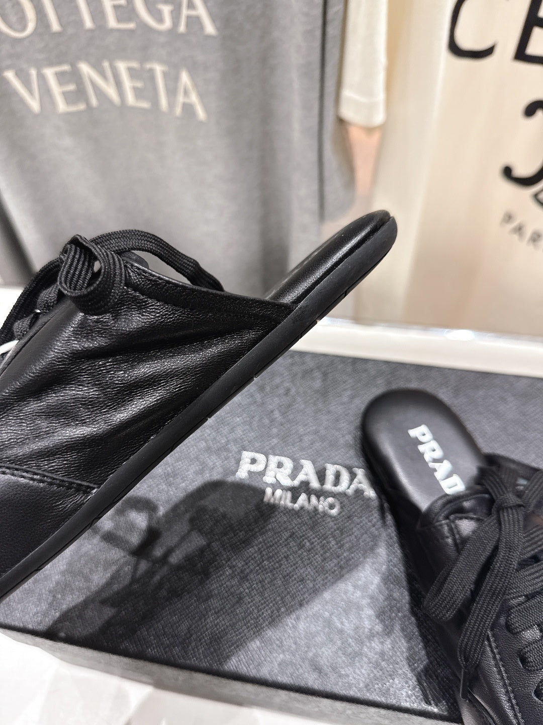 Prada 25s mule black sheepskin 535499