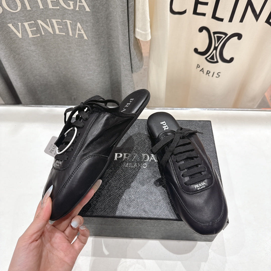 Prada 25s mule black sheepskin 535499