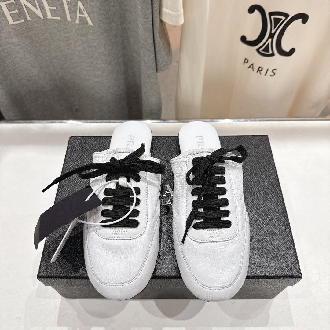 Prada 25s mule white sheepskin 535500