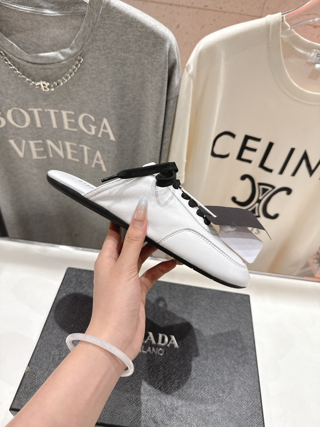 Prada 25s mule white sheepskin 535500