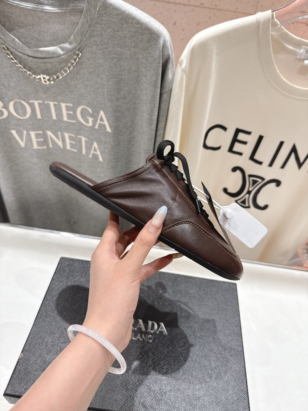 Prada 25s mule dark brown sheepskin 535501