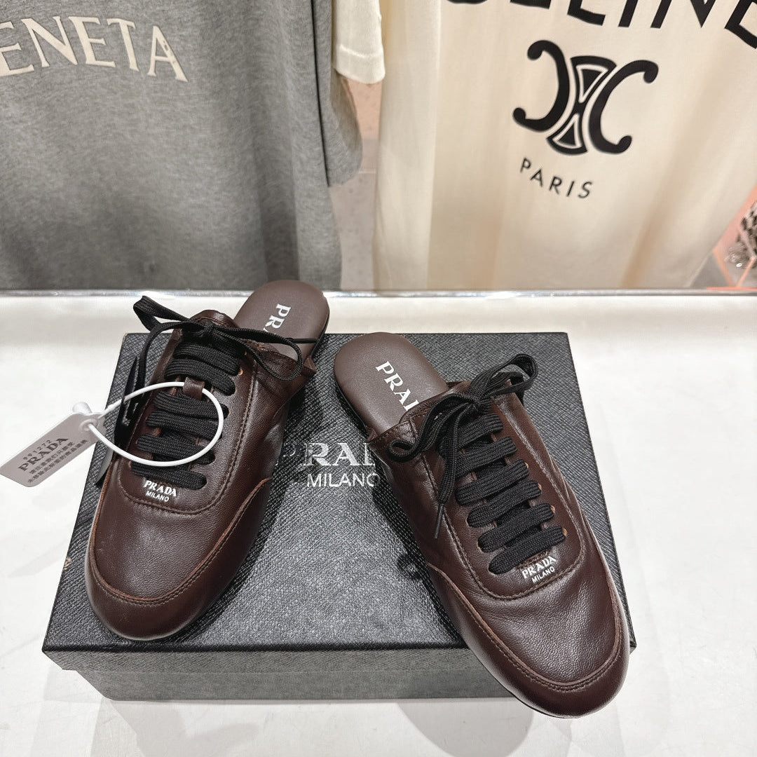 Prada 25s mule dark brown sheepskin 535501