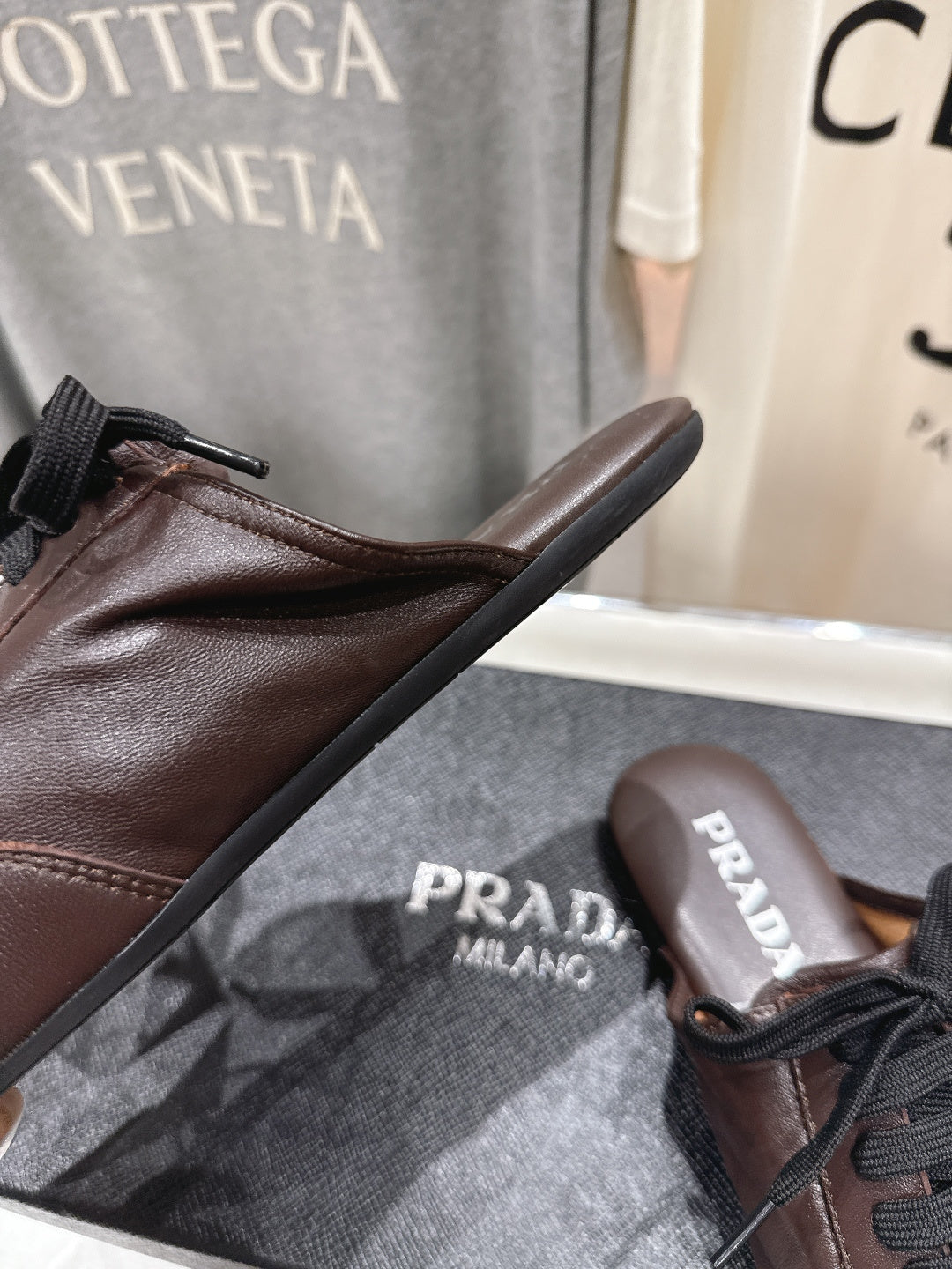 Prada 25s mule dark brown sheepskin 535501