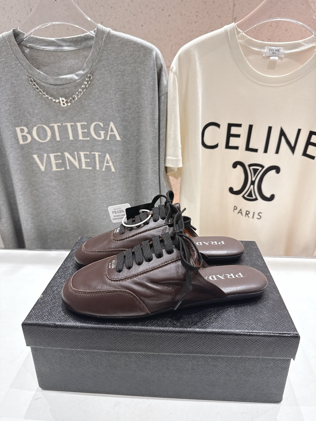 Prada 25s mule dark brown sheepskin 535501