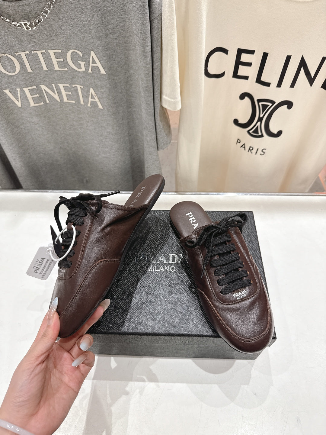 Prada 25s mule dark brown sheepskin 535501