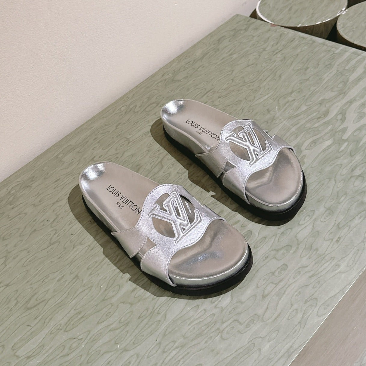 lv sandal isola flat mule silver metalic calfskin