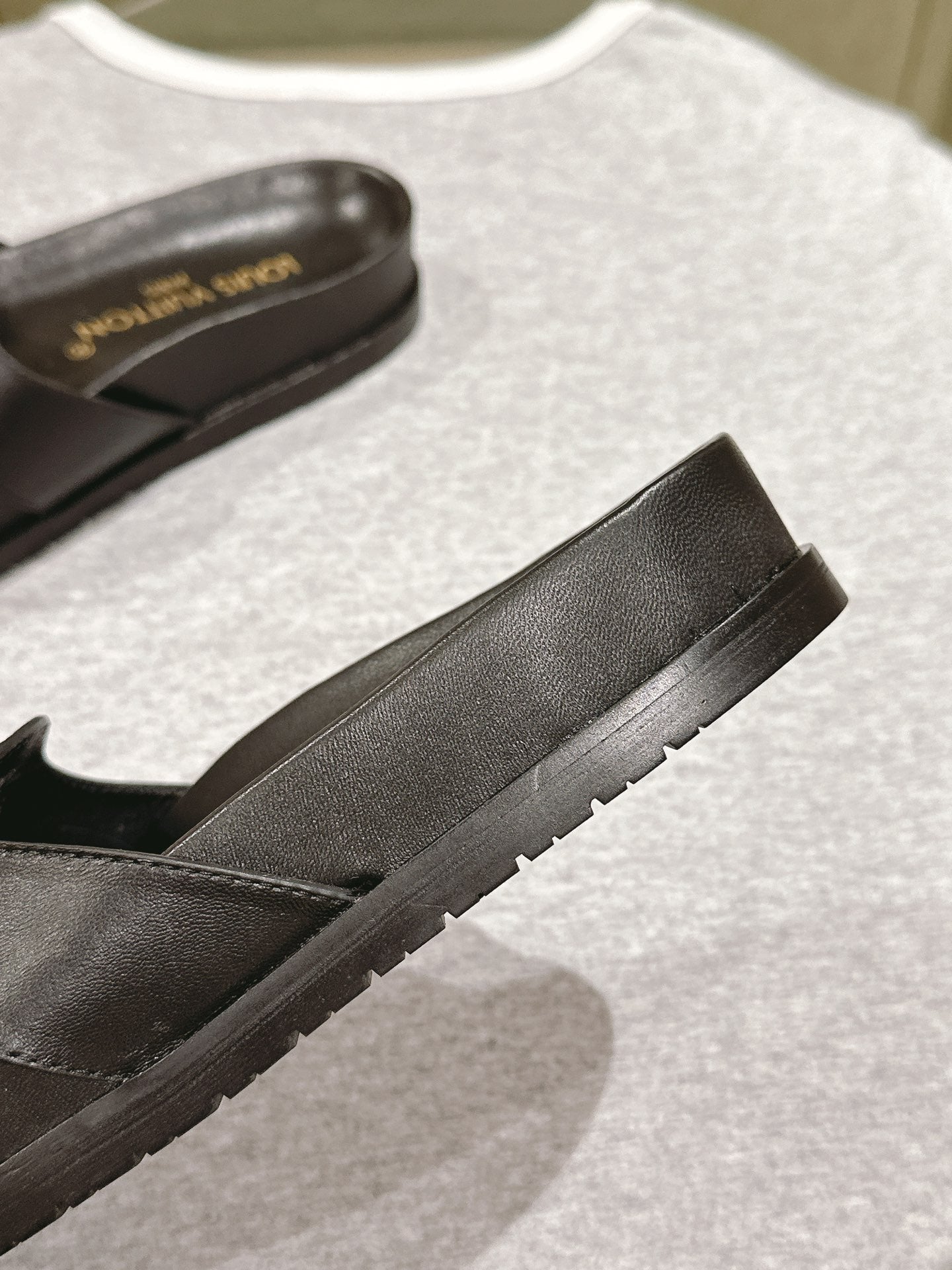 lv sandal isola flat mule black calfskin