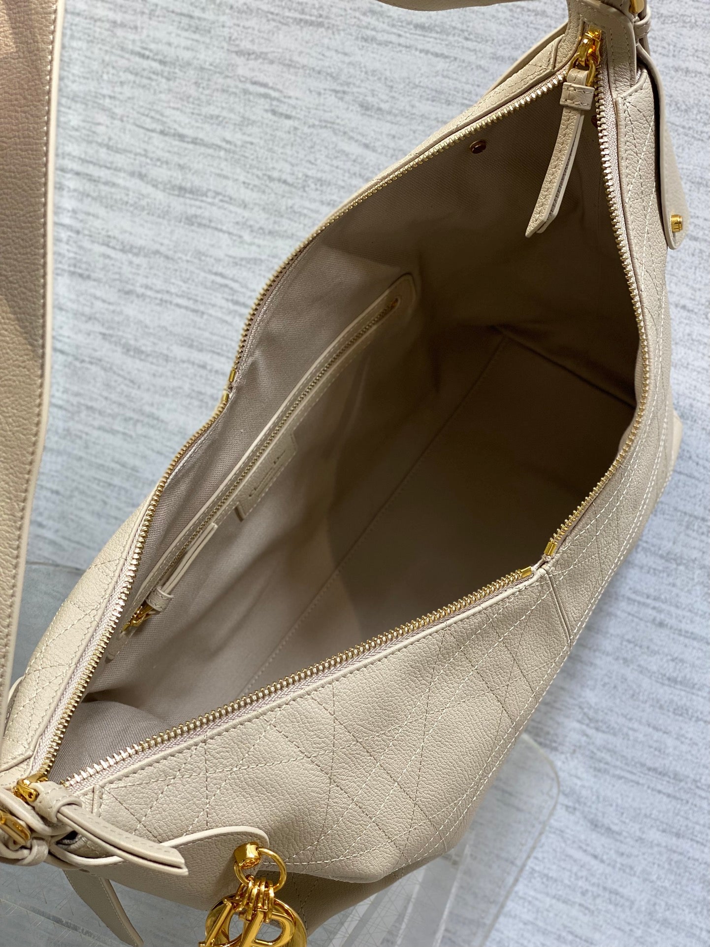 Dior 2025 Voyage Bag 34cm Powder Beige Grained Calfskin 267779