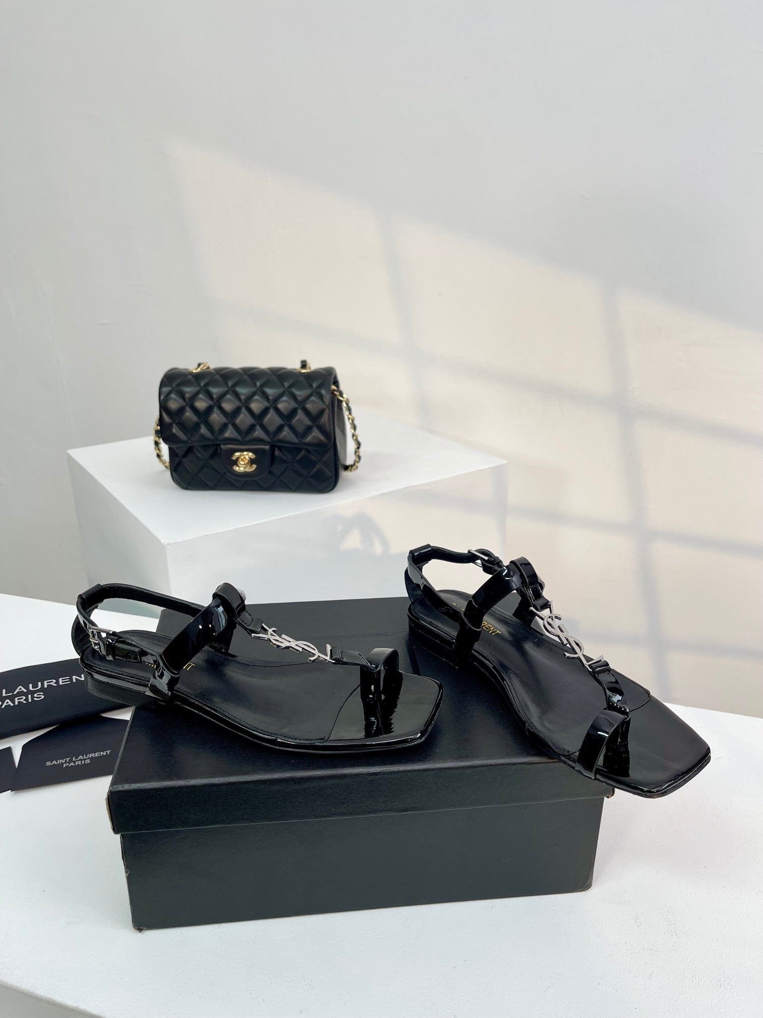 SL CASSANDRA ONE SANDAL FLAT BLACK CALFSKIN