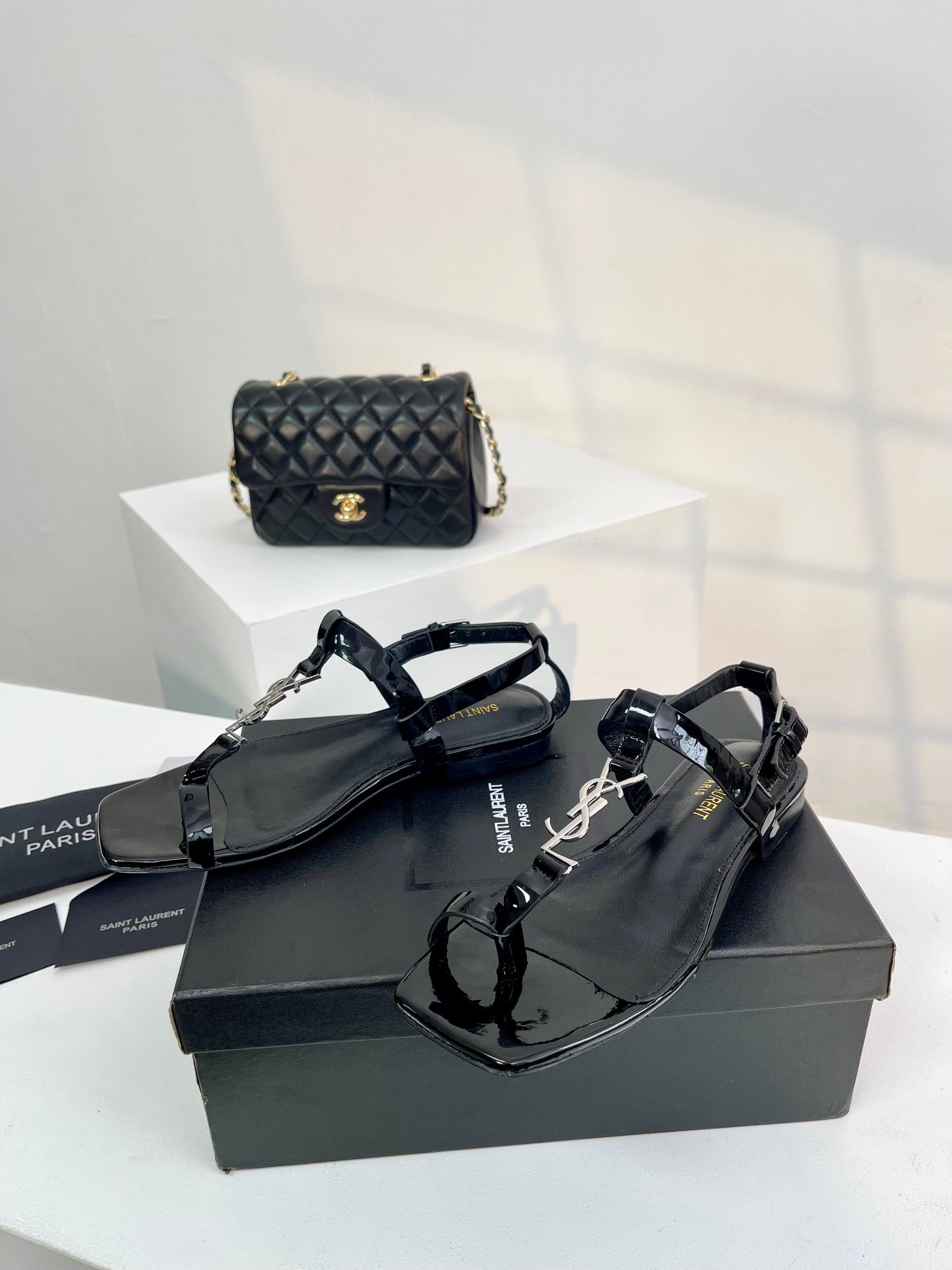 SL CASSANDRA ONE SANDAL FLAT BLACK CALFSKIN