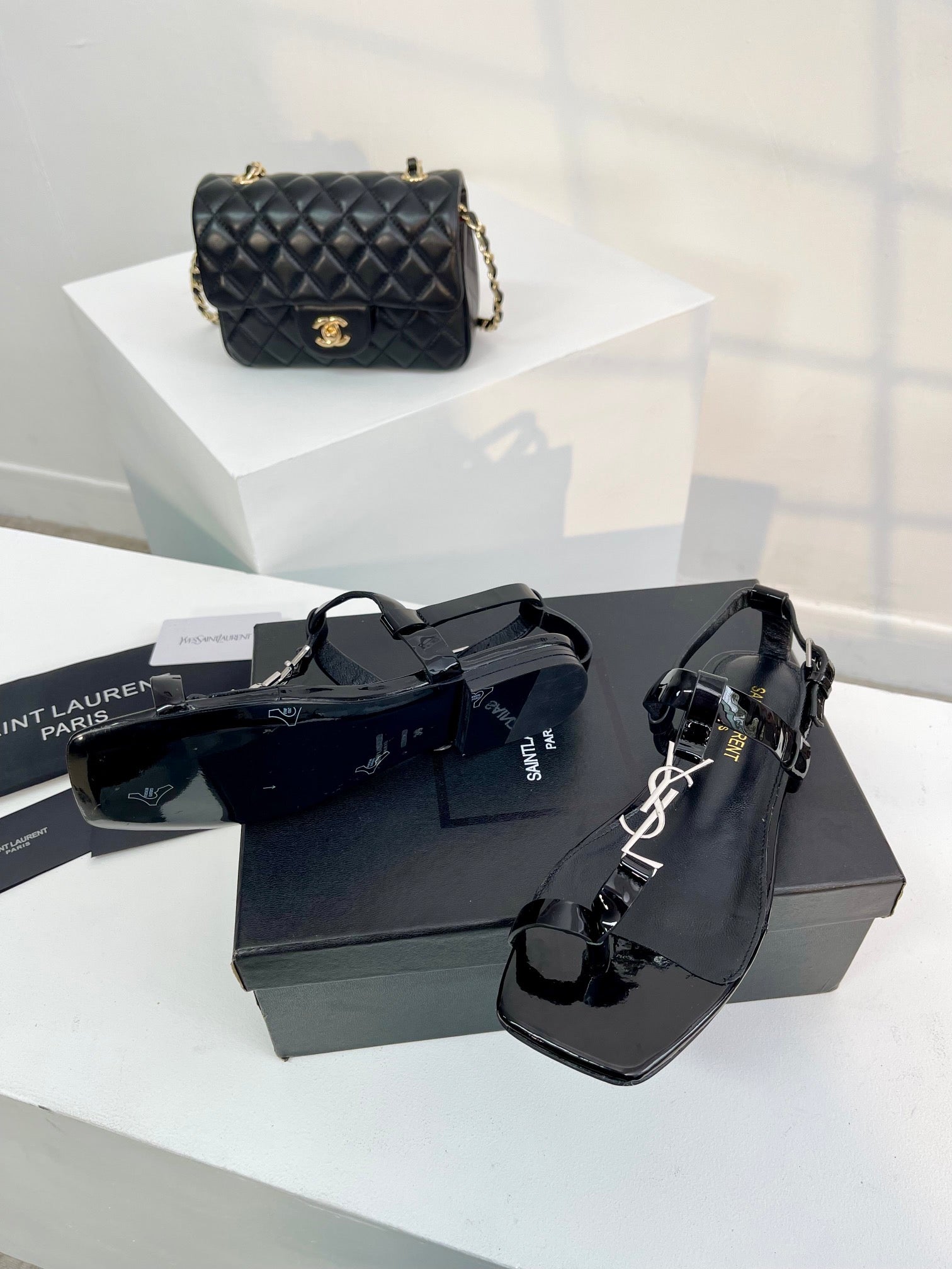 SL CASSANDRA ONE SANDAL FLAT BLACK CALFSKIN