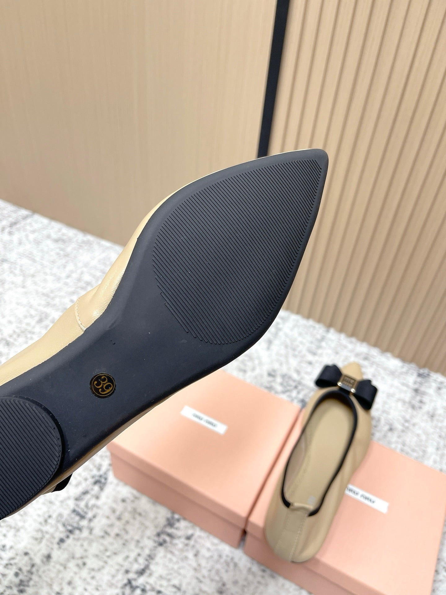 Miu Pointed-Toe Ballet Flats Beige Black Sheepskin 591562