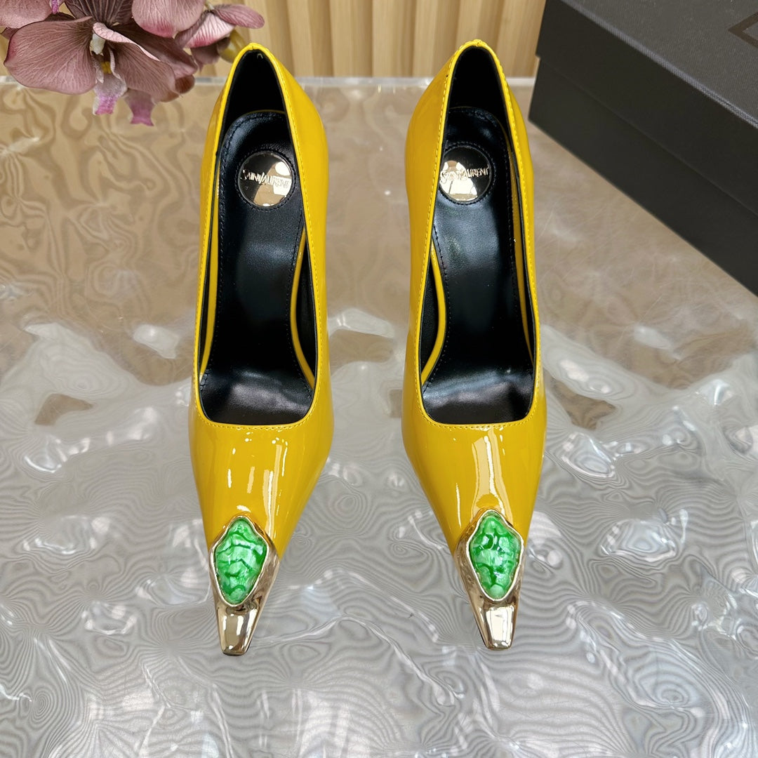 GREEN GEM-STUDDED HIGH PUMPS IN YELLOW PATENT CALFSKIN