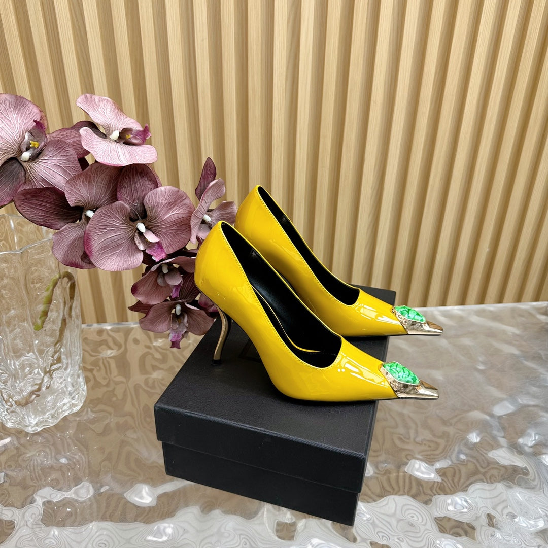 GREEN GEM-STUDDED HIGH PUMPS IN YELLOW PATENT CALFSKIN