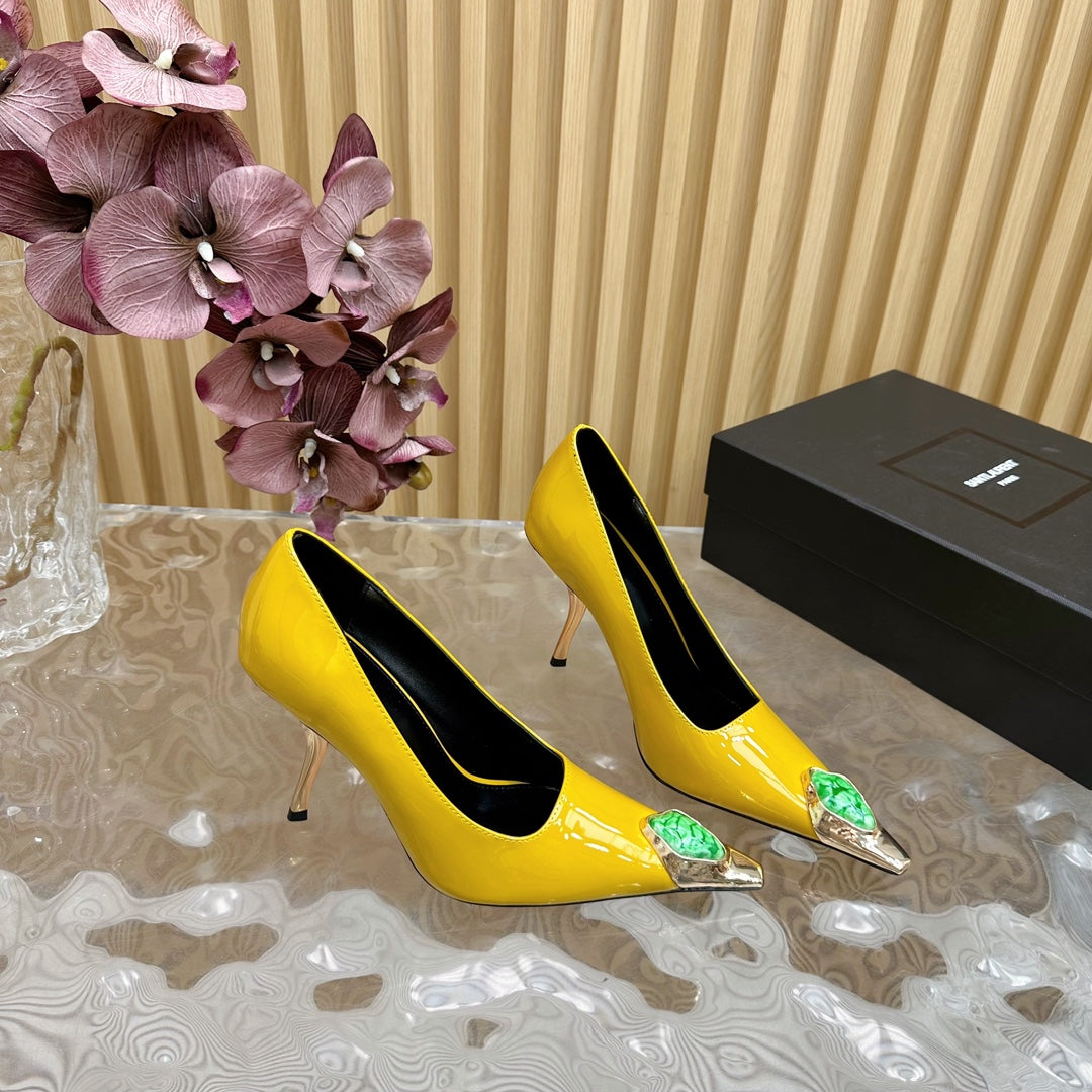 GREEN GEM-STUDDED HIGH PUMPS IN YELLOW PATENT CALFSKIN