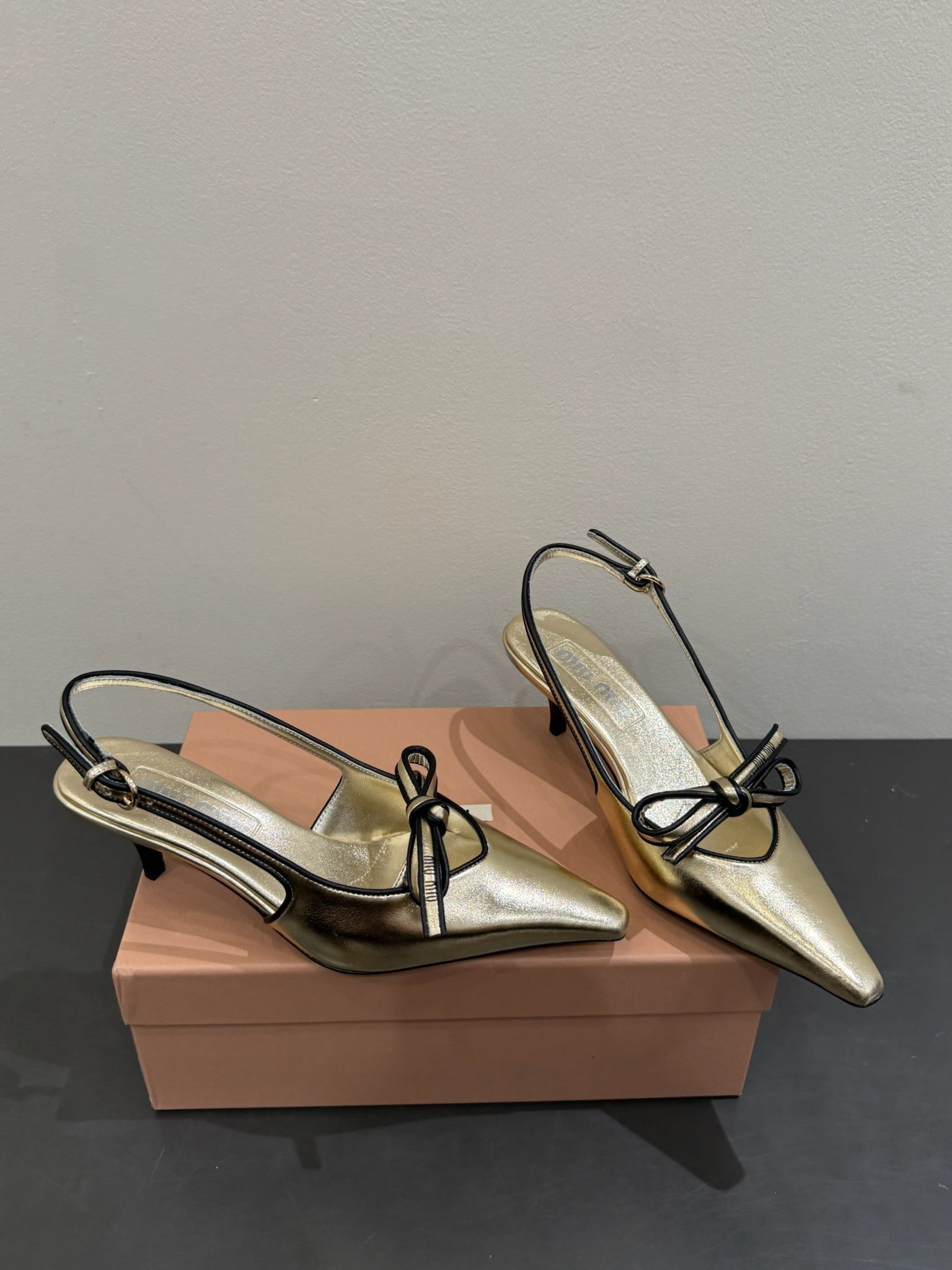 Miu slingback pump metallic gold leather