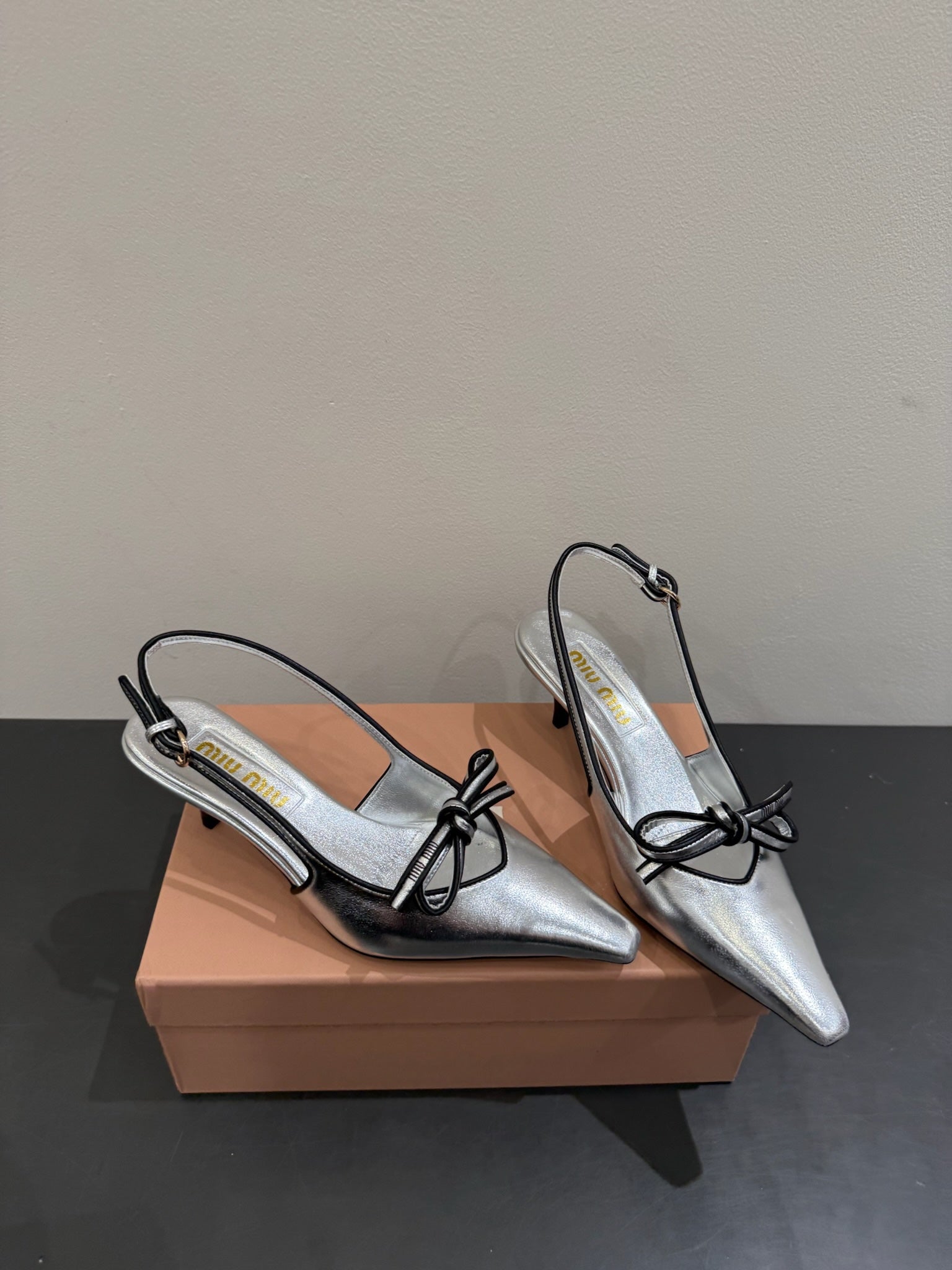 Miu slingback pump metallic sliver leather