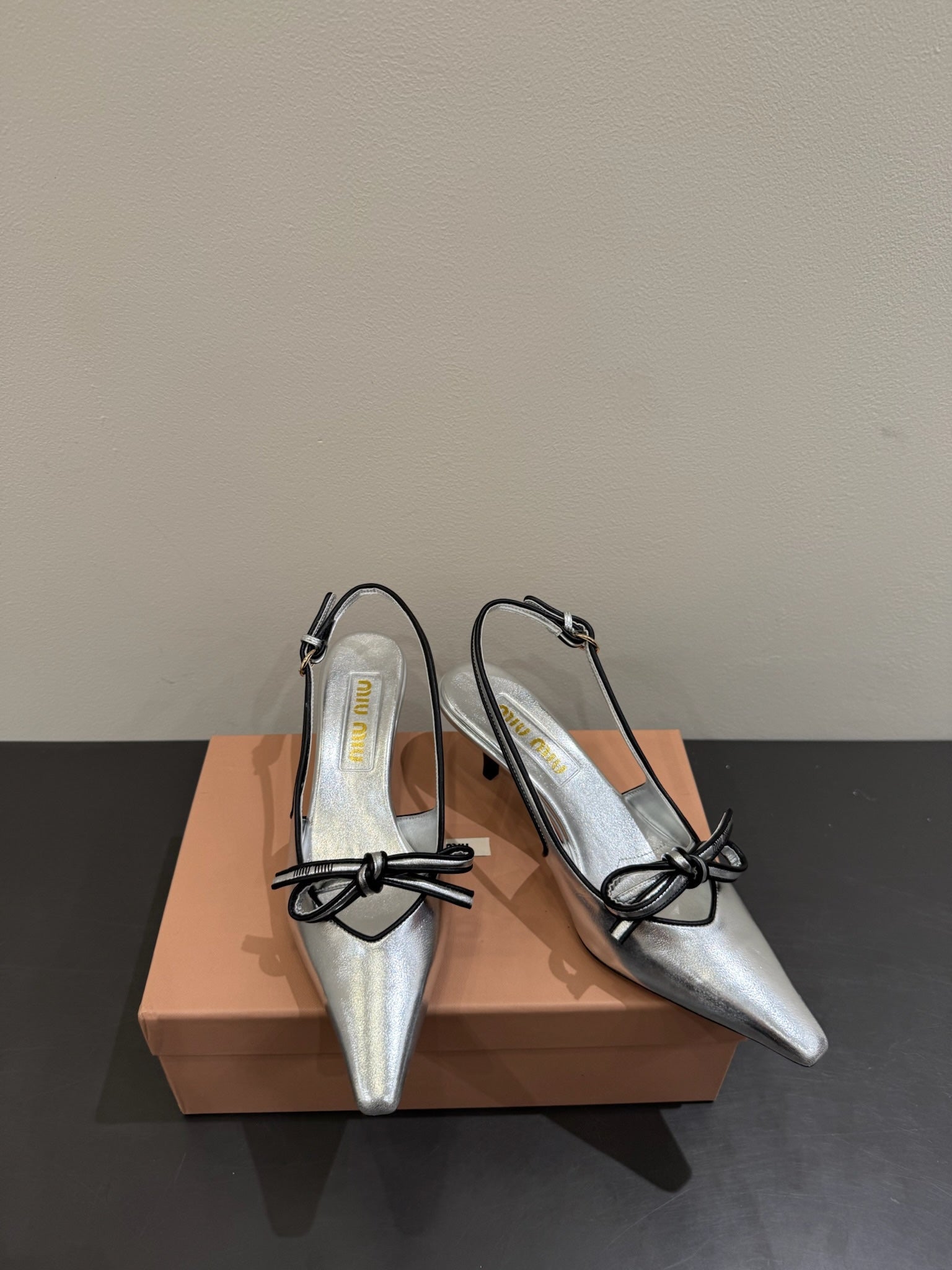 Miu slingback pump metallic sliver leather