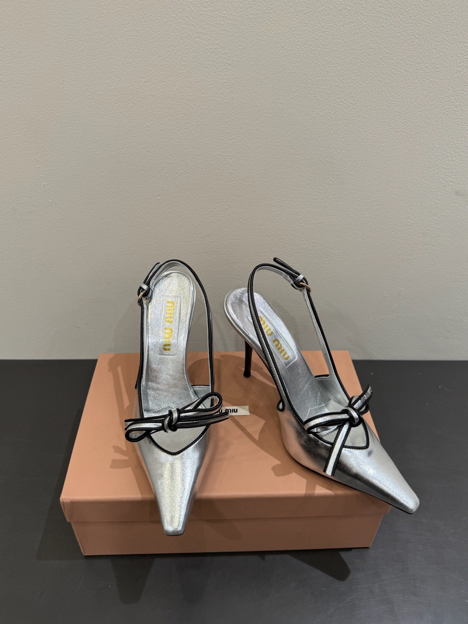 Miu slingback pump metallic sliver leather