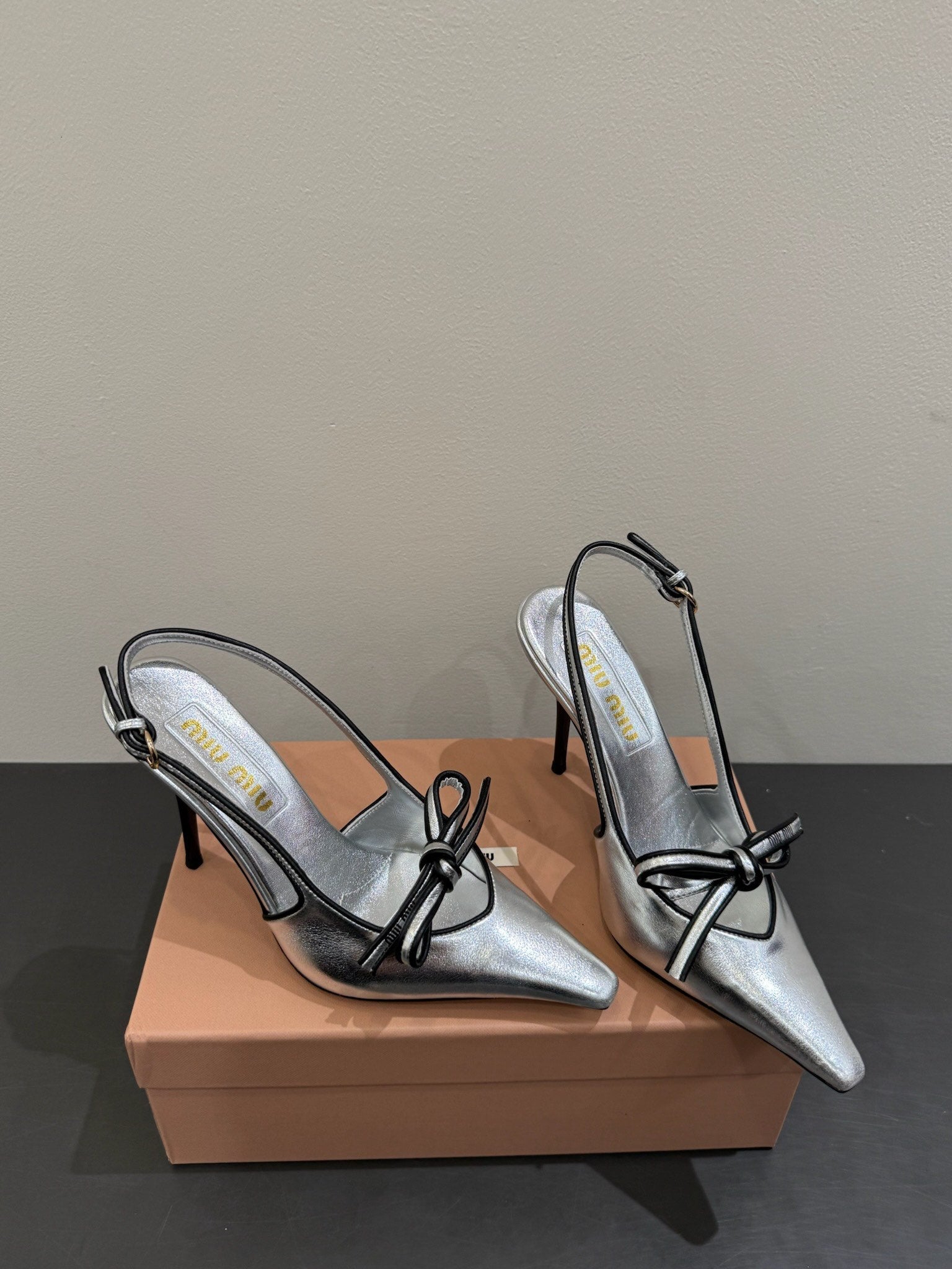 Miu slingback pump metallic sliver leather