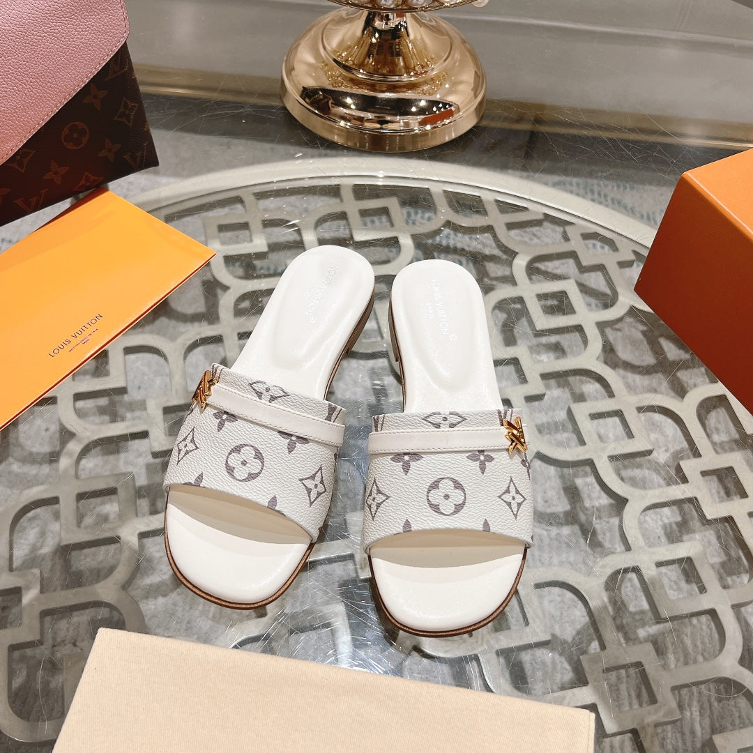 lv sandal isola flat mule cream monogram calfskin