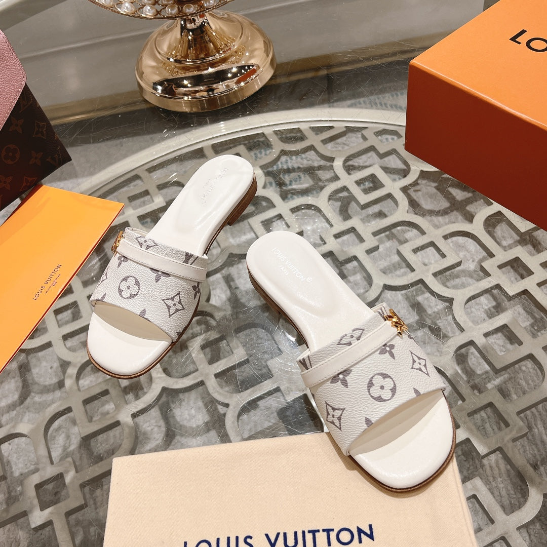 lv sandal isola flat mule cream monogram calfskin
