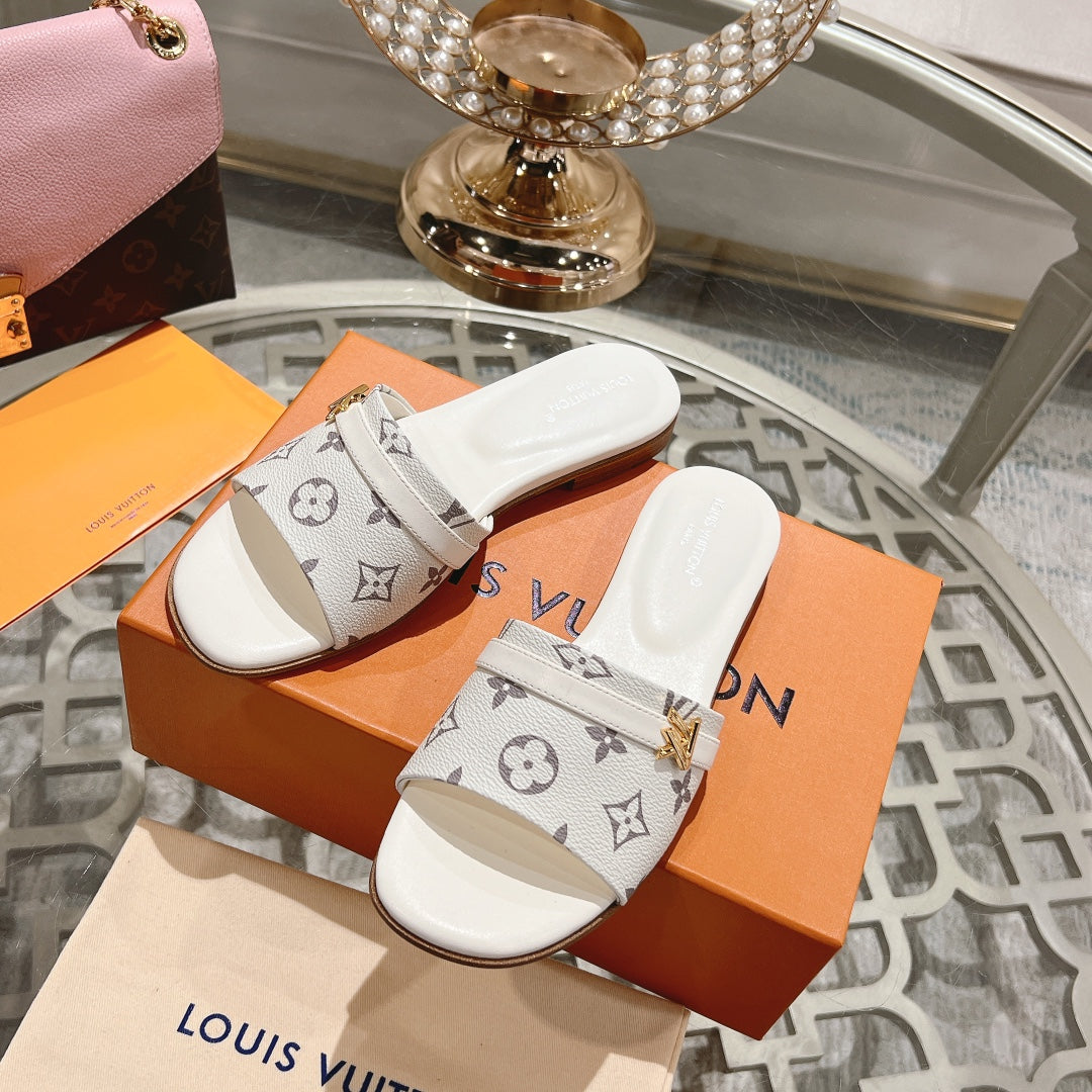lv sandal isola flat mule cream monogram calfskin