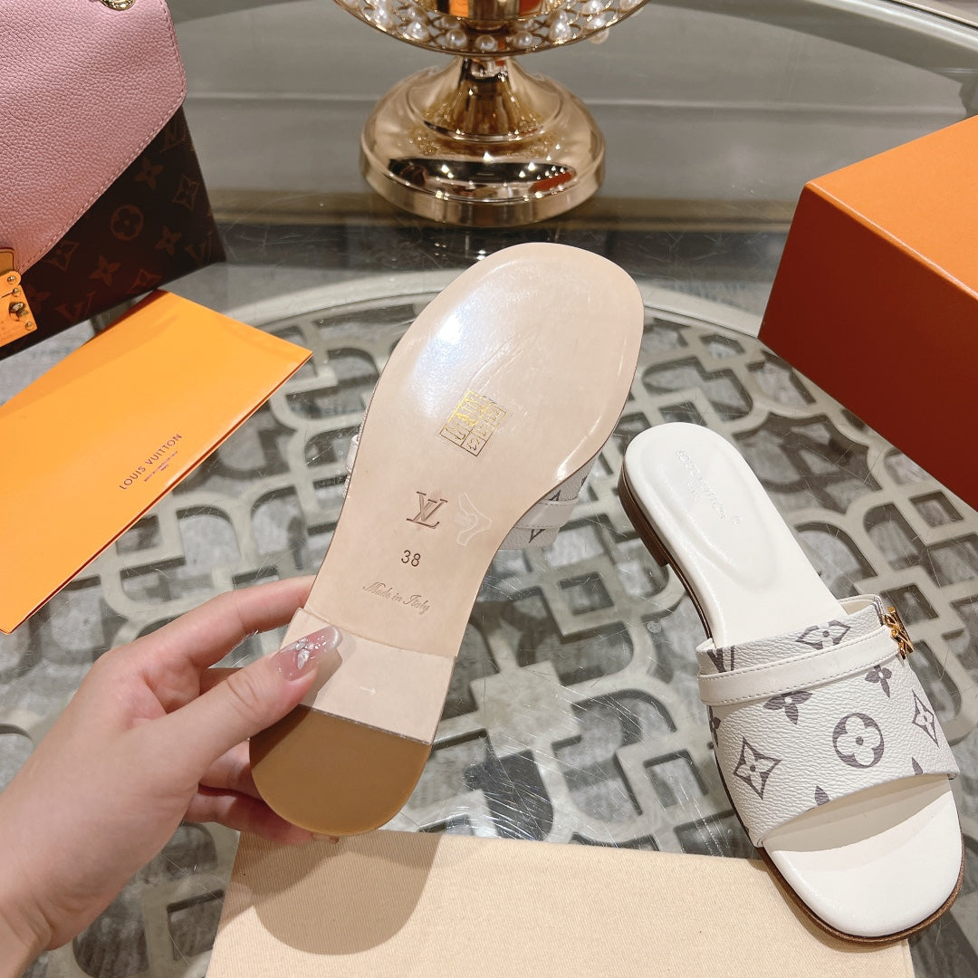 lv sandal isola flat mule cream monogram calfskin
