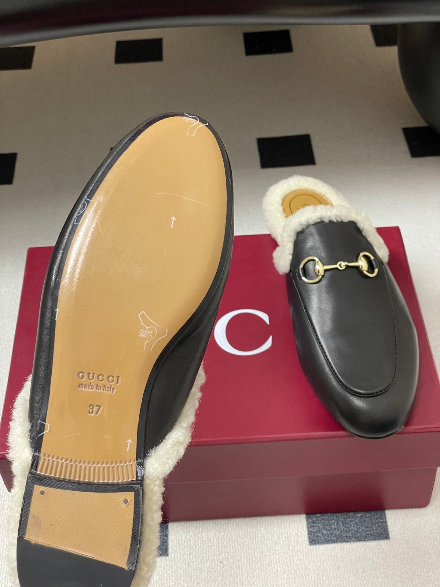 GG horsebit flat mules black cowhide 534713