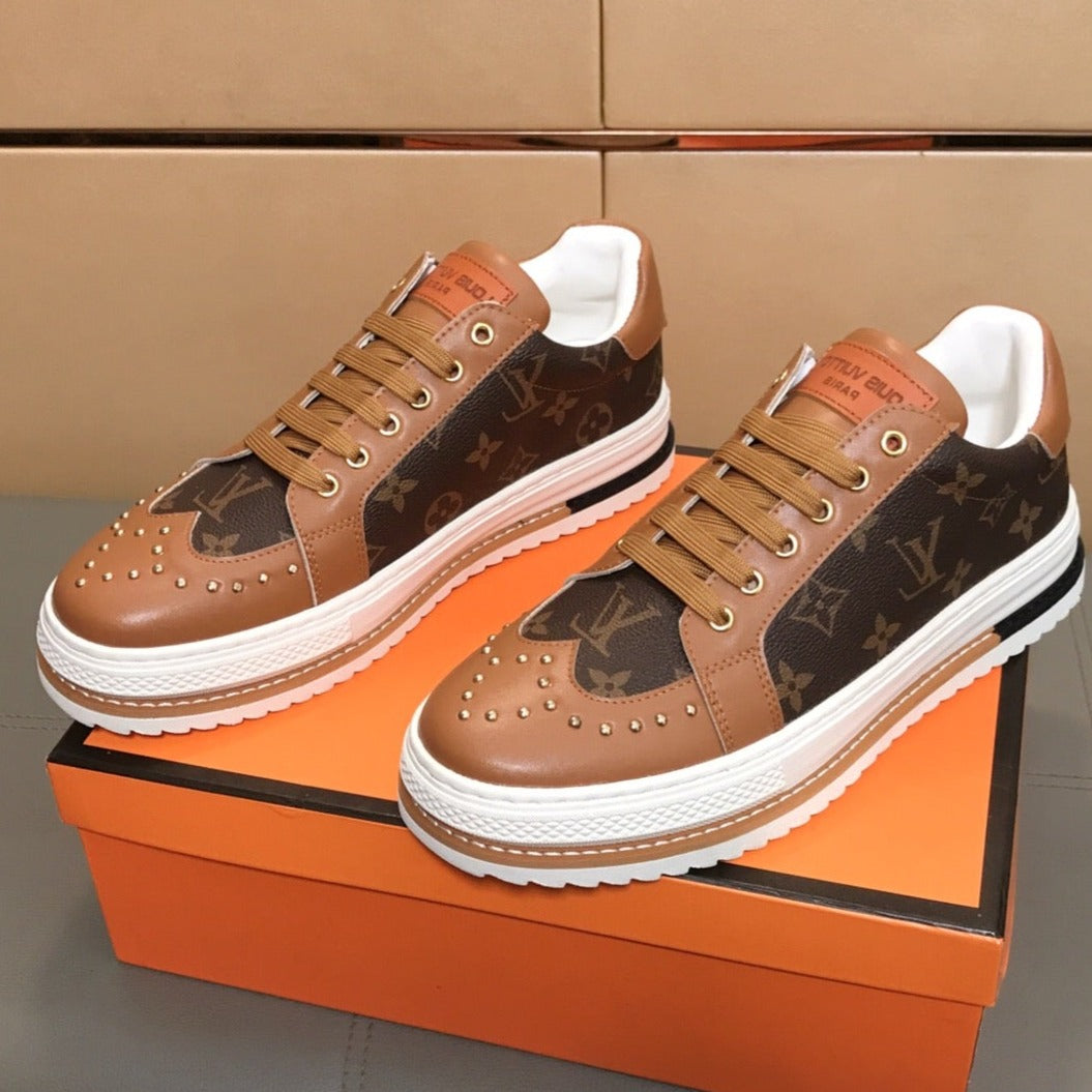 LV TRAINER IN BROWN MONOGRAM CALFSKIN