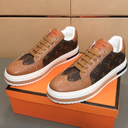 LV TRAINER IN BROWN MONOGRAM CALFSKIN