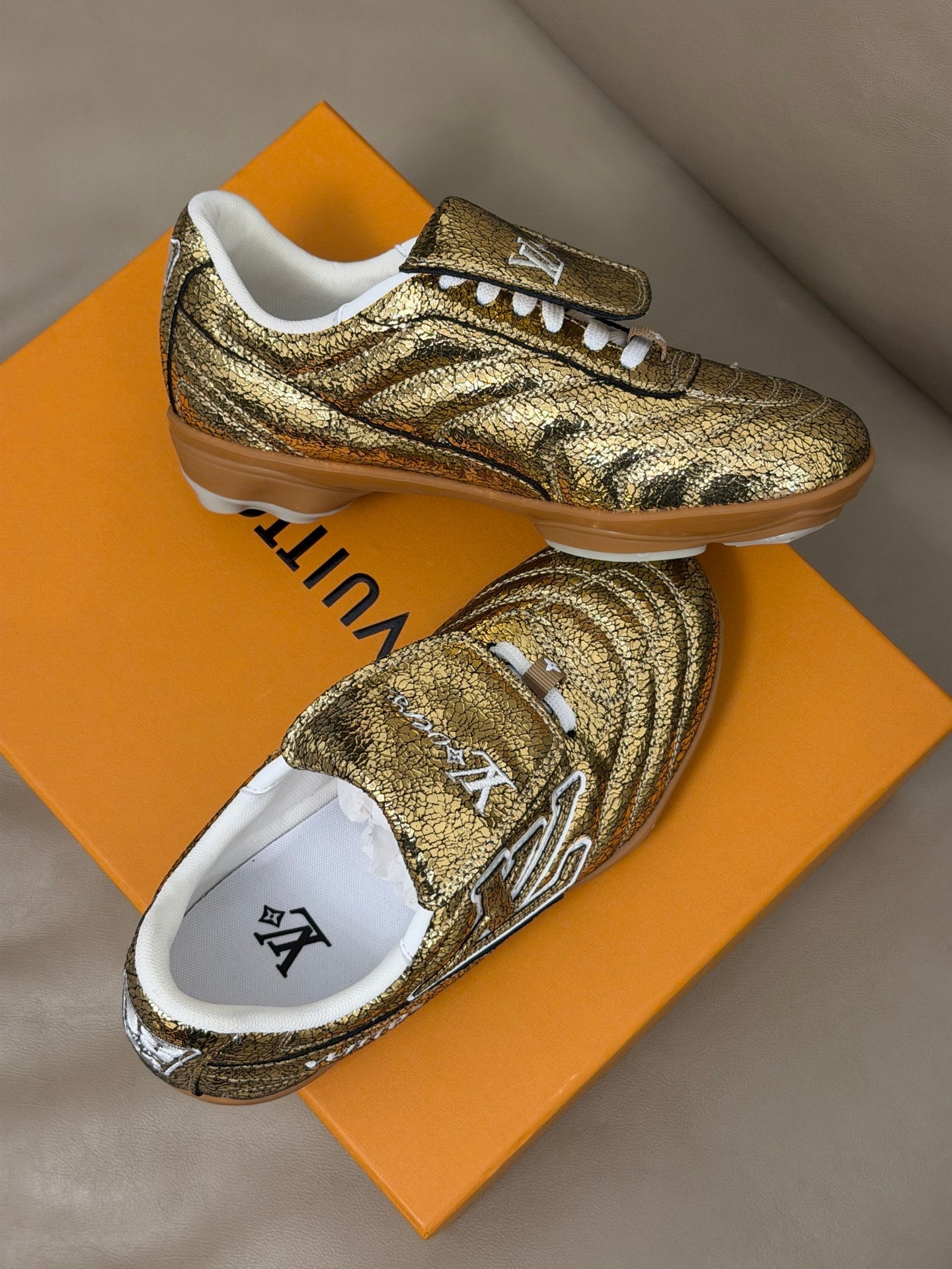 LV x Pharrell Footprint 26ss Sneaker Gold Pebble Leather 621149