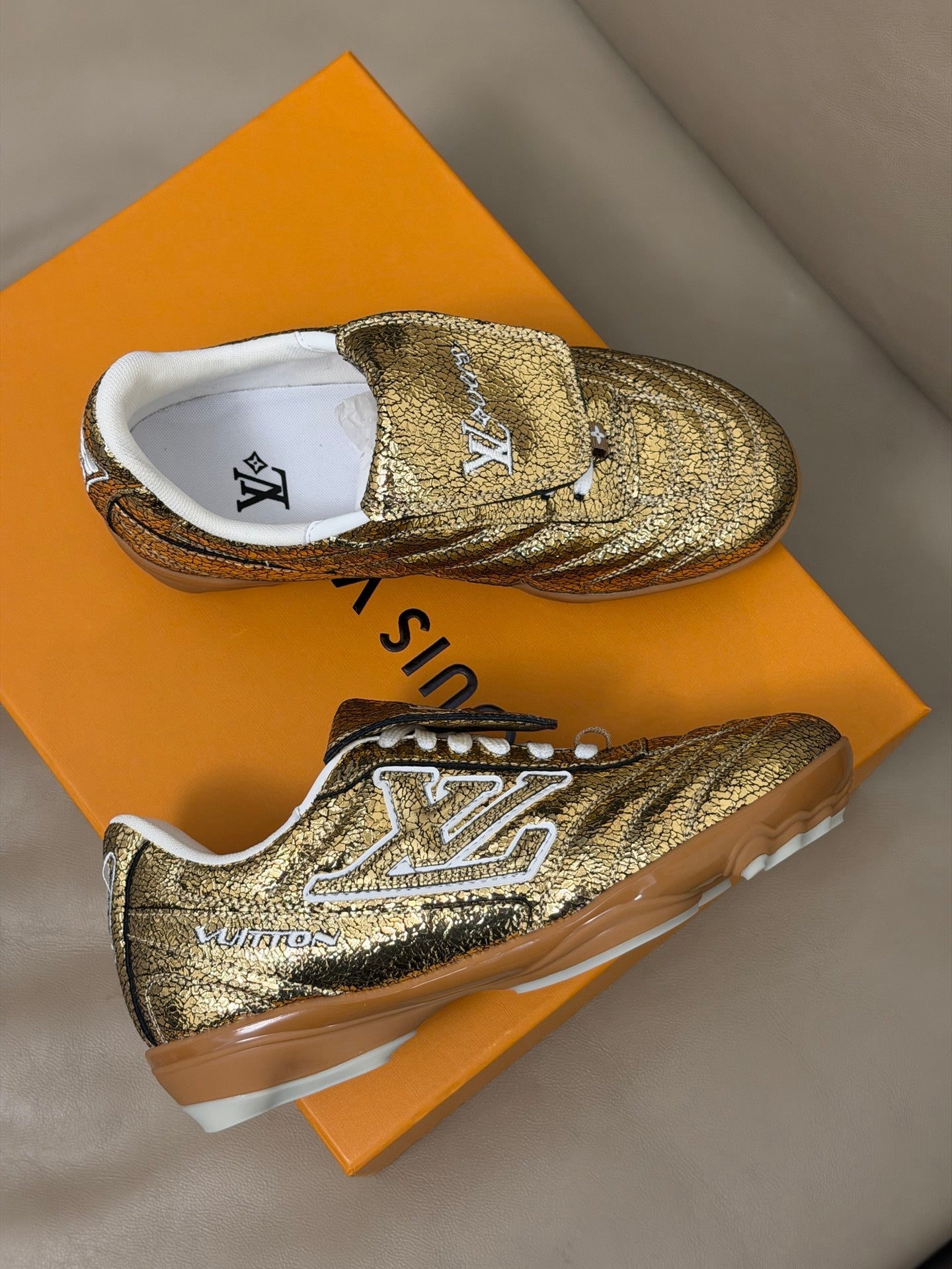 LV x Pharrell Footprint 26ss Sneaker Gold Pebble Leather 621149