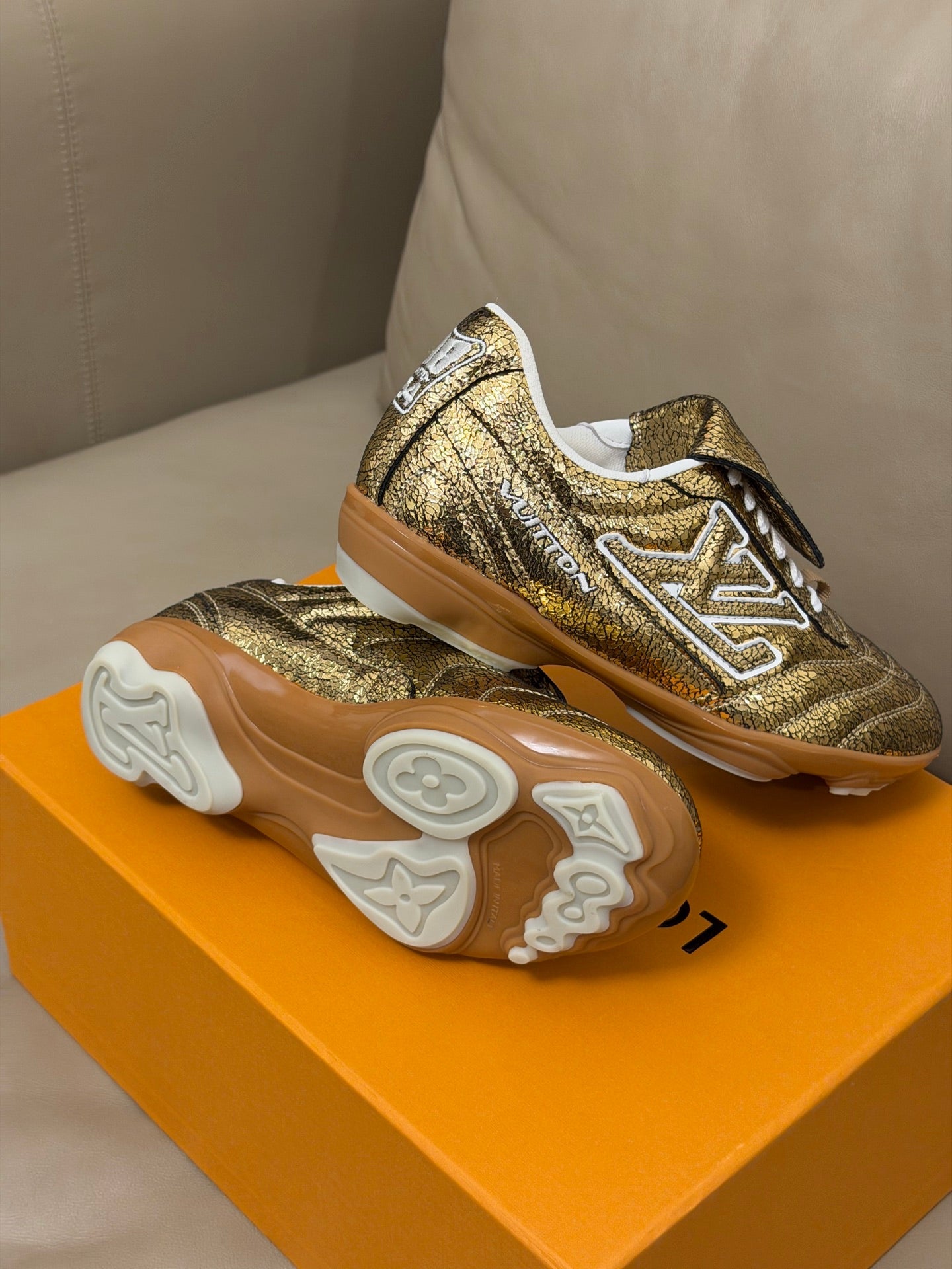 LV x Pharrell Footprint 26ss Sneaker Gold Pebble Leather 621149