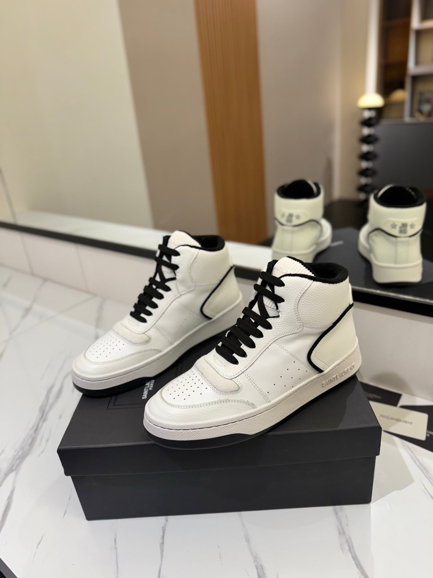 MID-TOP SNEAKERS IN WHITE AND BLACK TRIM PERFORATED LAMBSKIN
