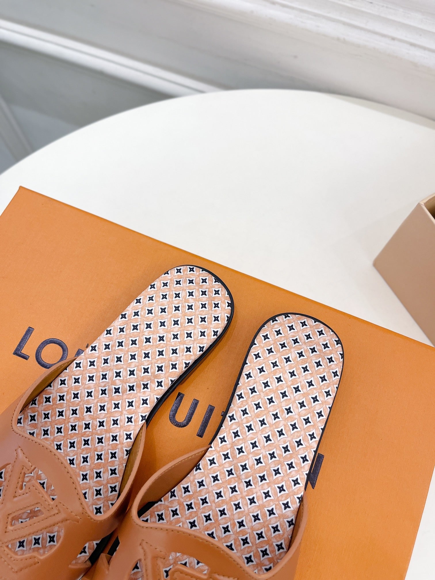 lv sandal isola flat mule brown calfskin star monogram