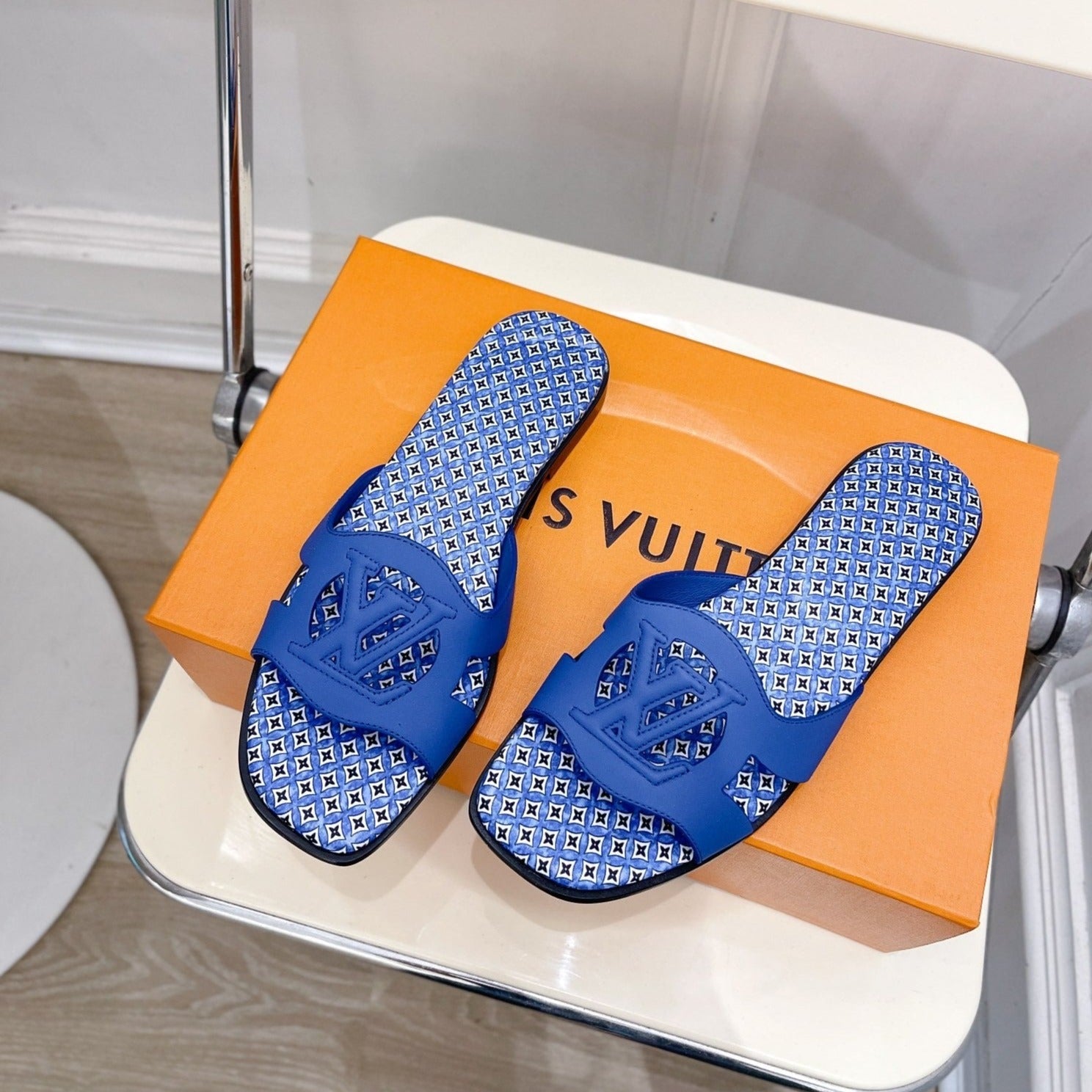 lv sandal isola flat mule blue calfskin star monogram